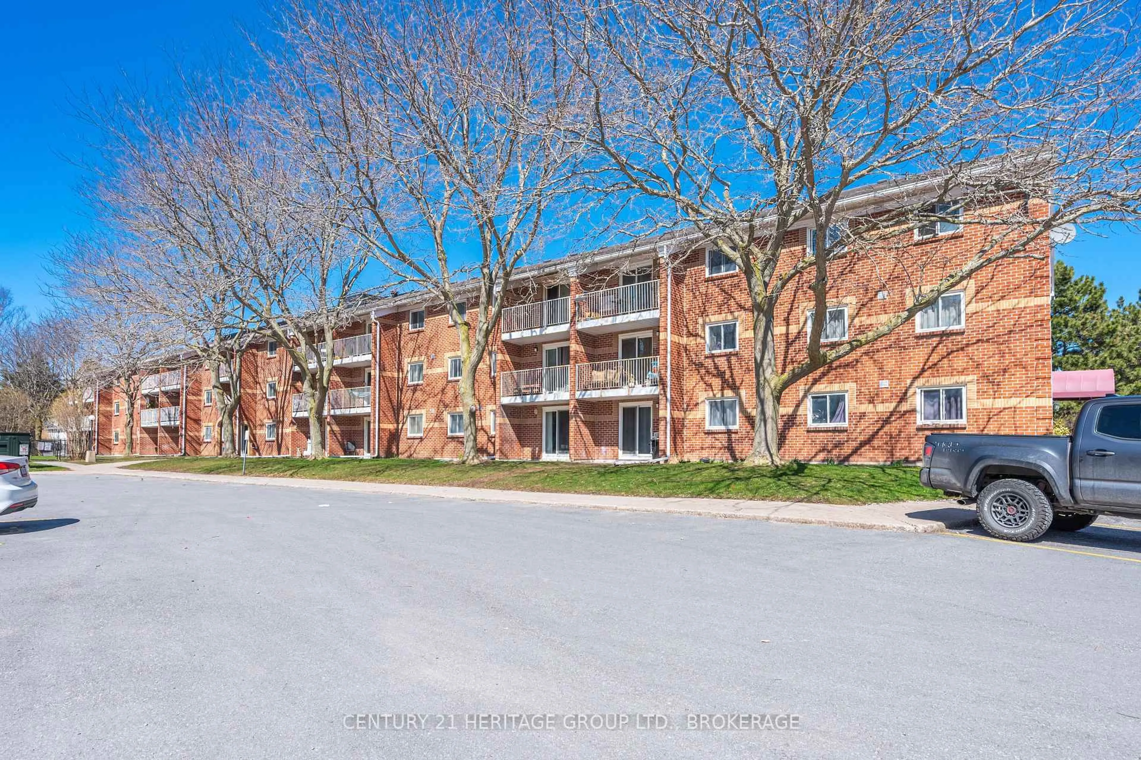 A pic from outside/outdoor area/front of a property/back of a property/a pic from drone, unknown for 573 Armstrong Rd #203, Kingston Ontario K7M 8J8