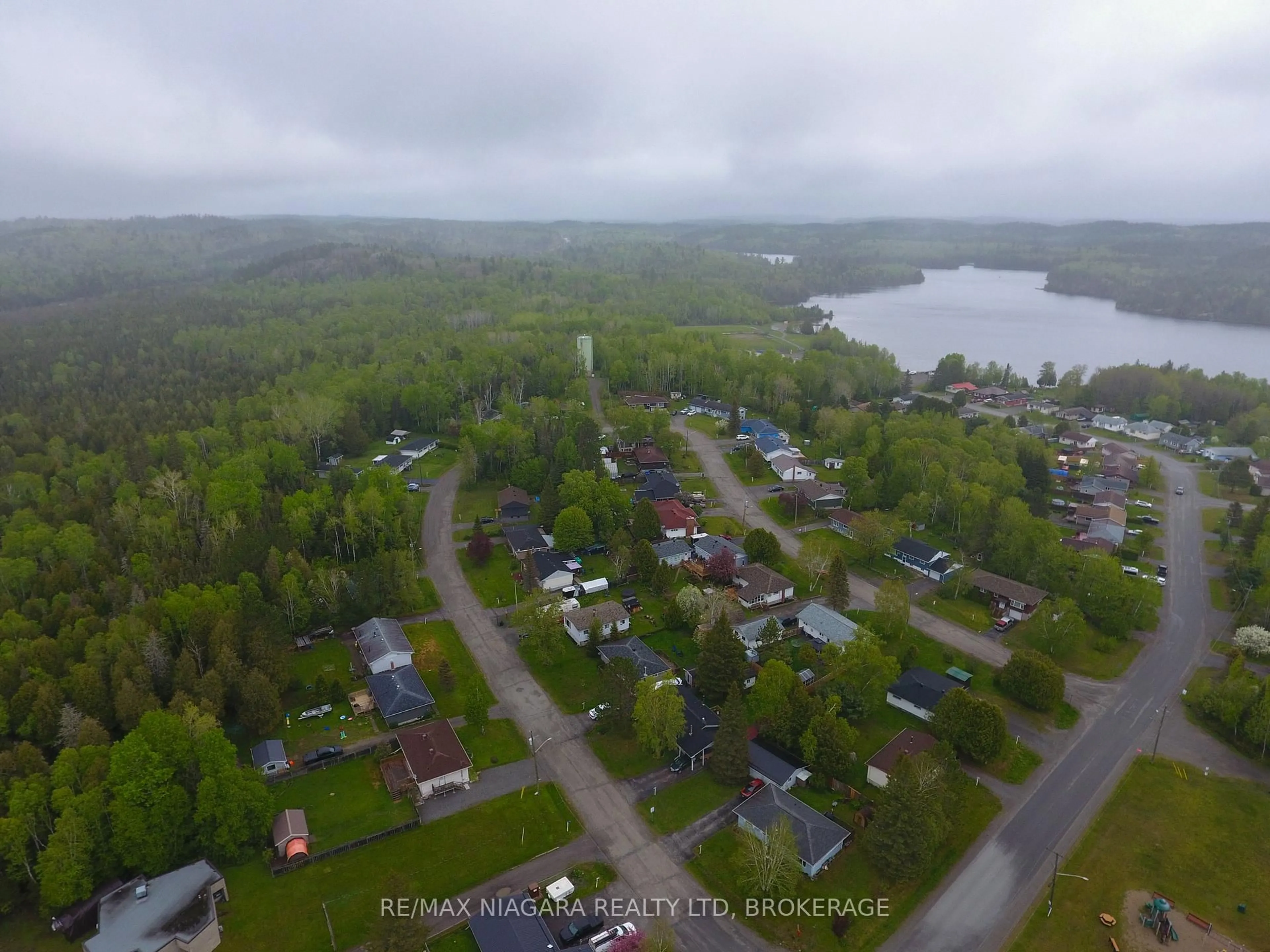 A pic from outside/outdoor area/front of a property/back of a property/a pic from drone, water/lake/river/ocean view for 31 Spruce Dr, Temagami Ontario P0H 2H0