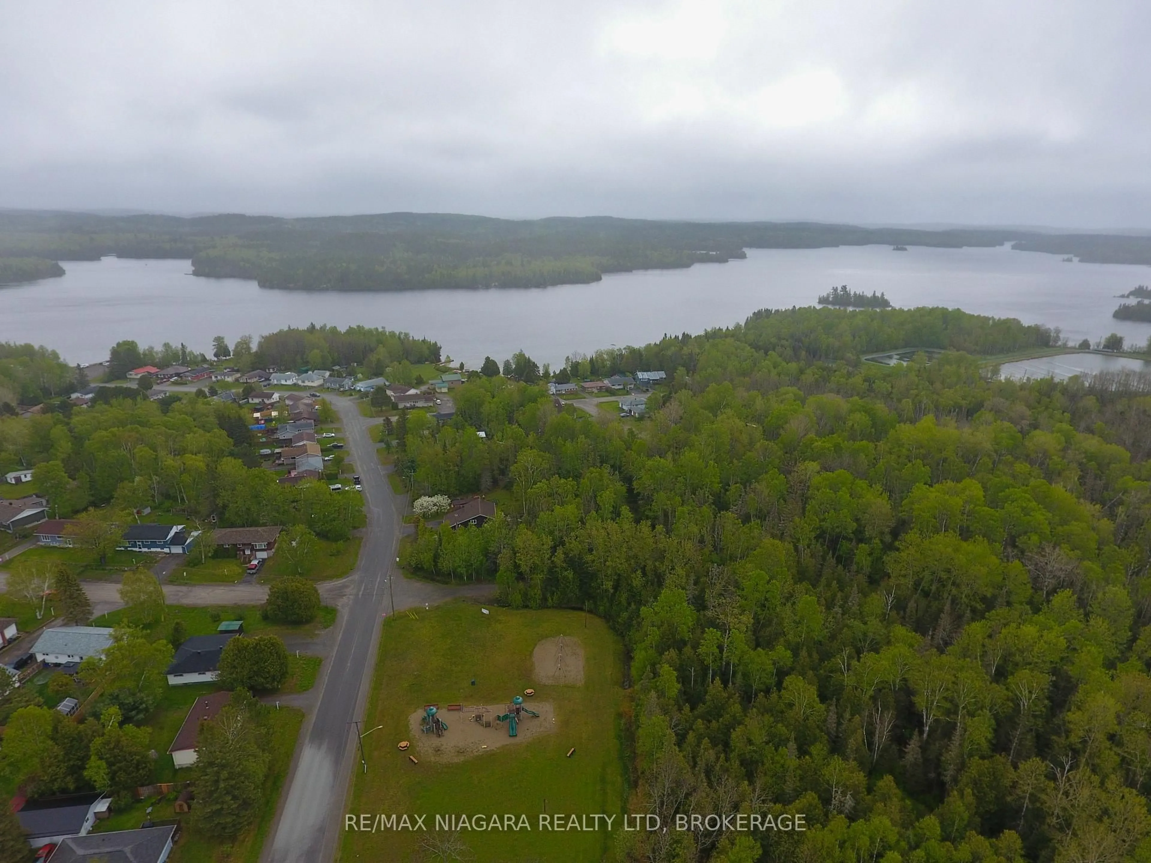 A pic from outside/outdoor area/front of a property/back of a property/a pic from drone, water/lake/river/ocean view for 31 Spruce Dr, Temagami Ontario P0H 2H0