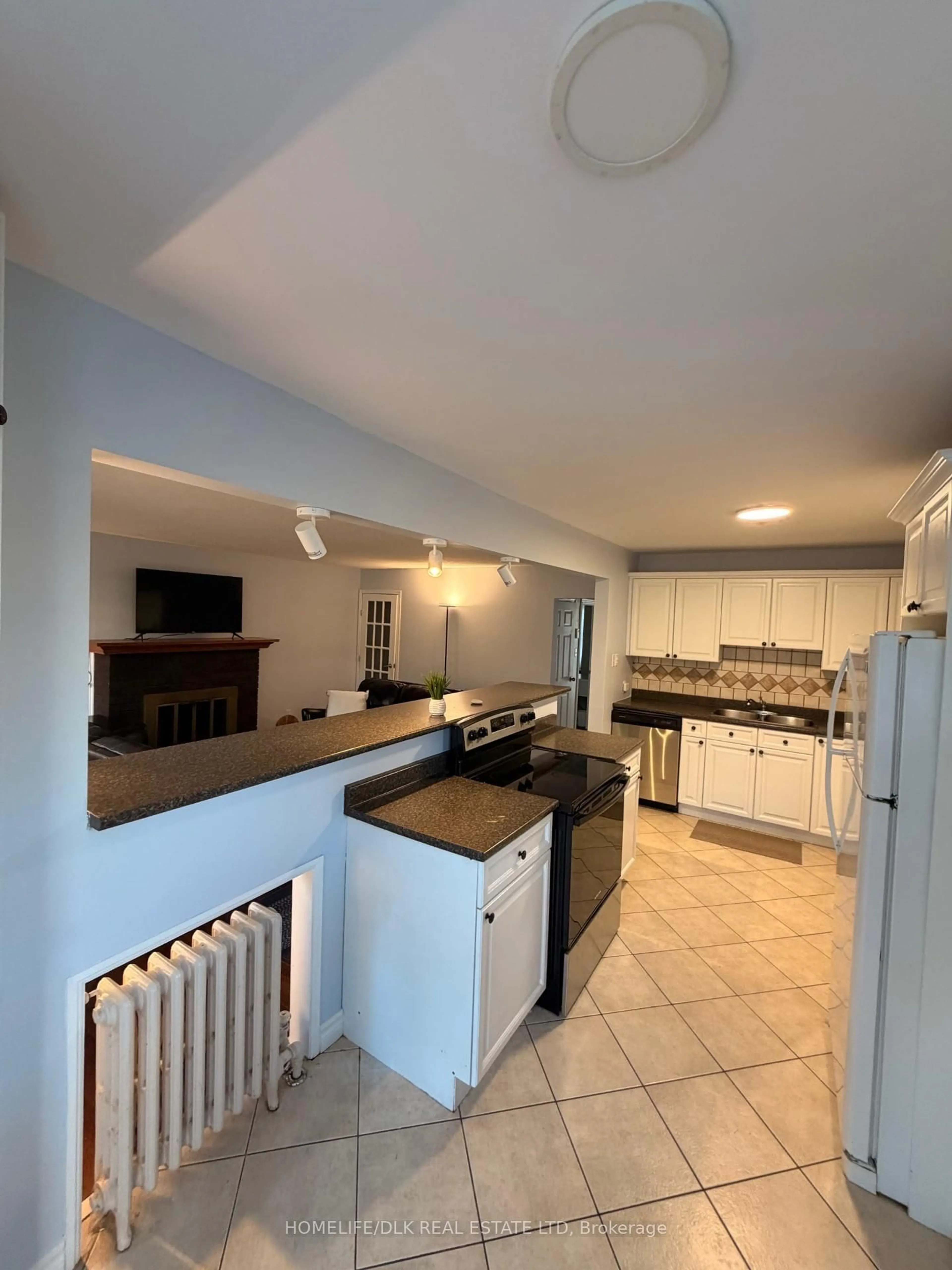 Open concept kitchen, ceramic/tile floor for 644 Grosvenor St, London East Ontario N5Y 3T4