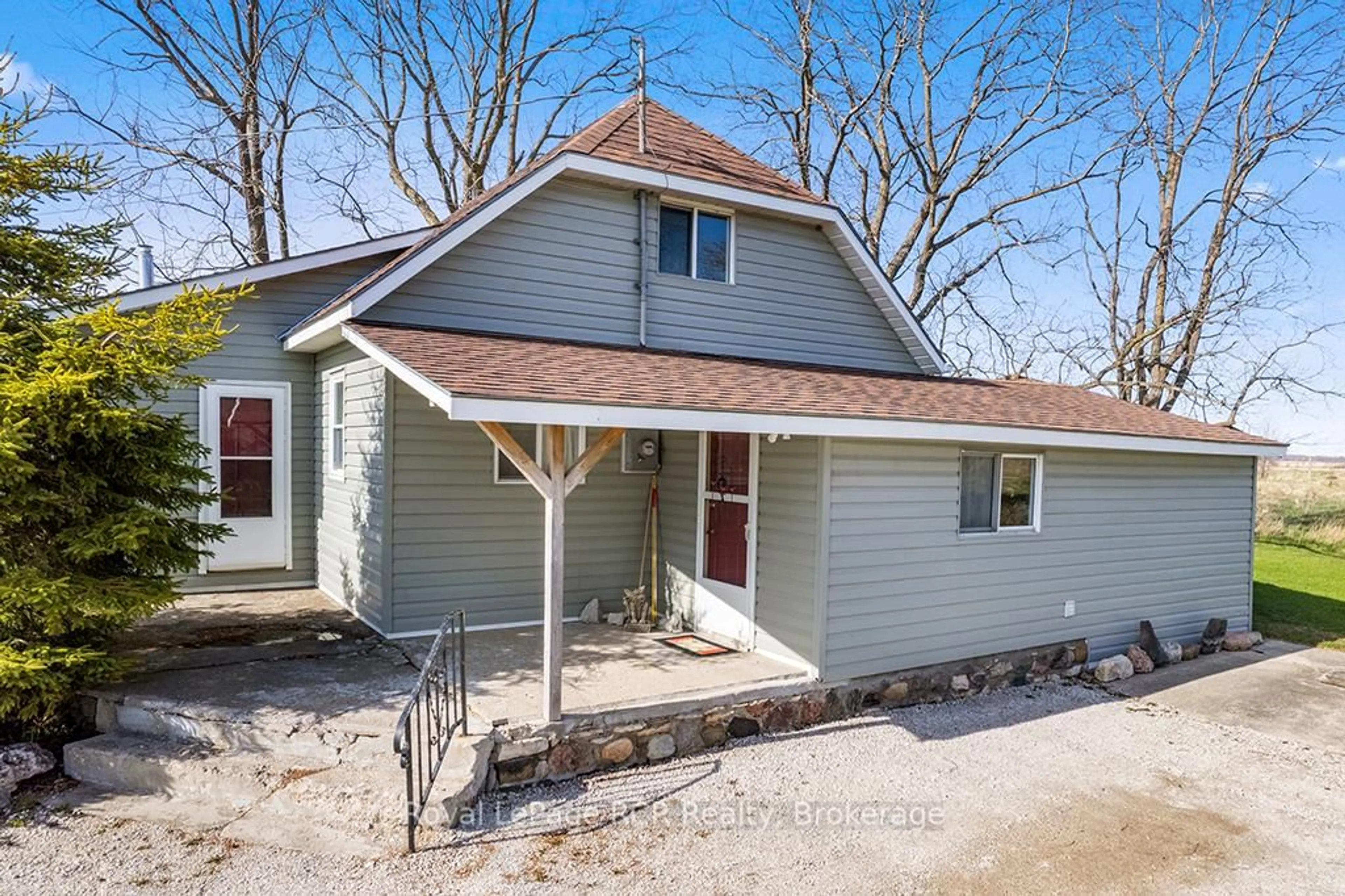 Home with vinyl exterior material, street for 2882 6 Highway, Northern Bruce Peninsula Ontario N0H 1W0