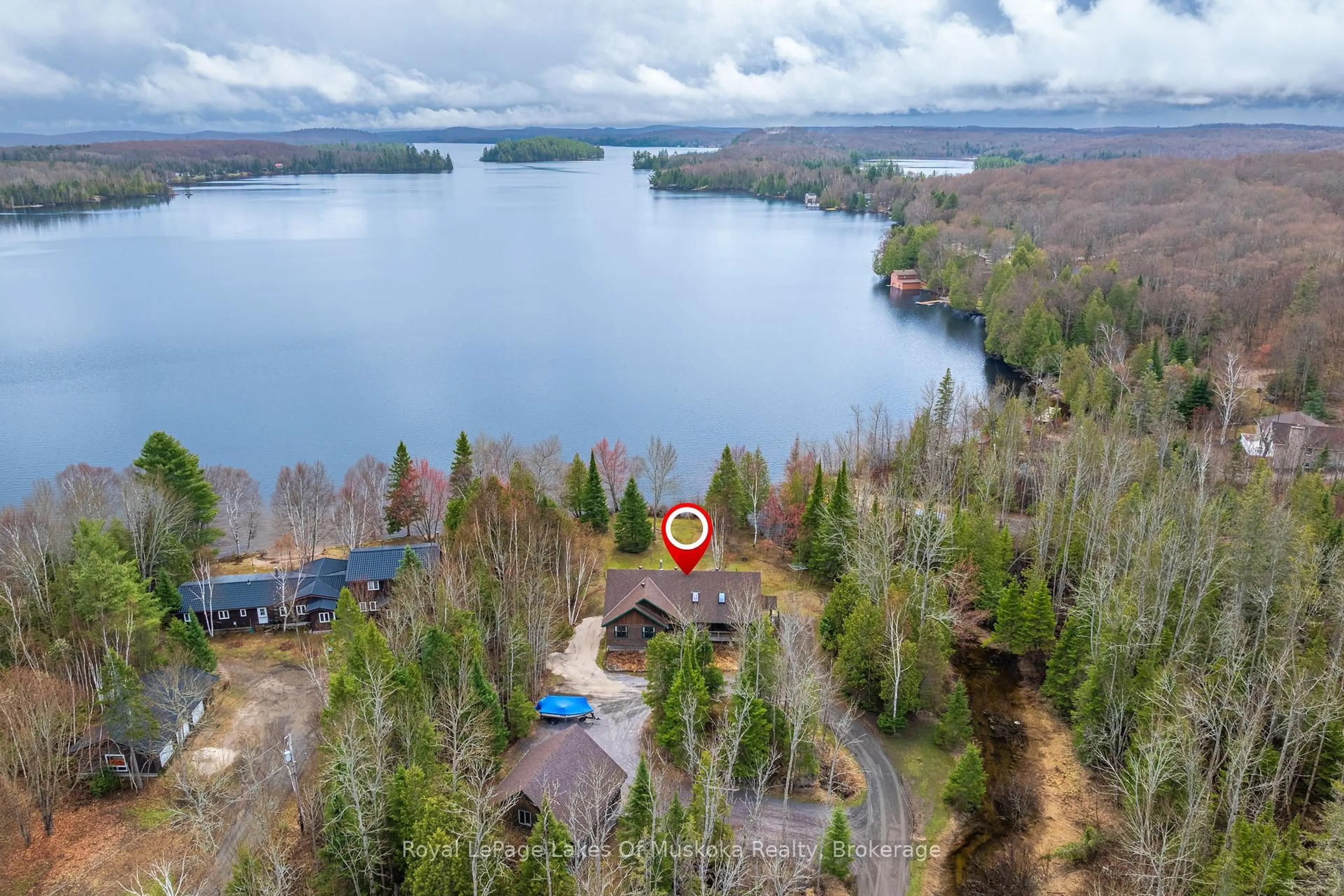 A pic from outside/outdoor area/front of a property/back of a property/a pic from drone, water/lake/river/ocean view for 3149 520 Highway, Magnetawan Ontario P0A 1P0