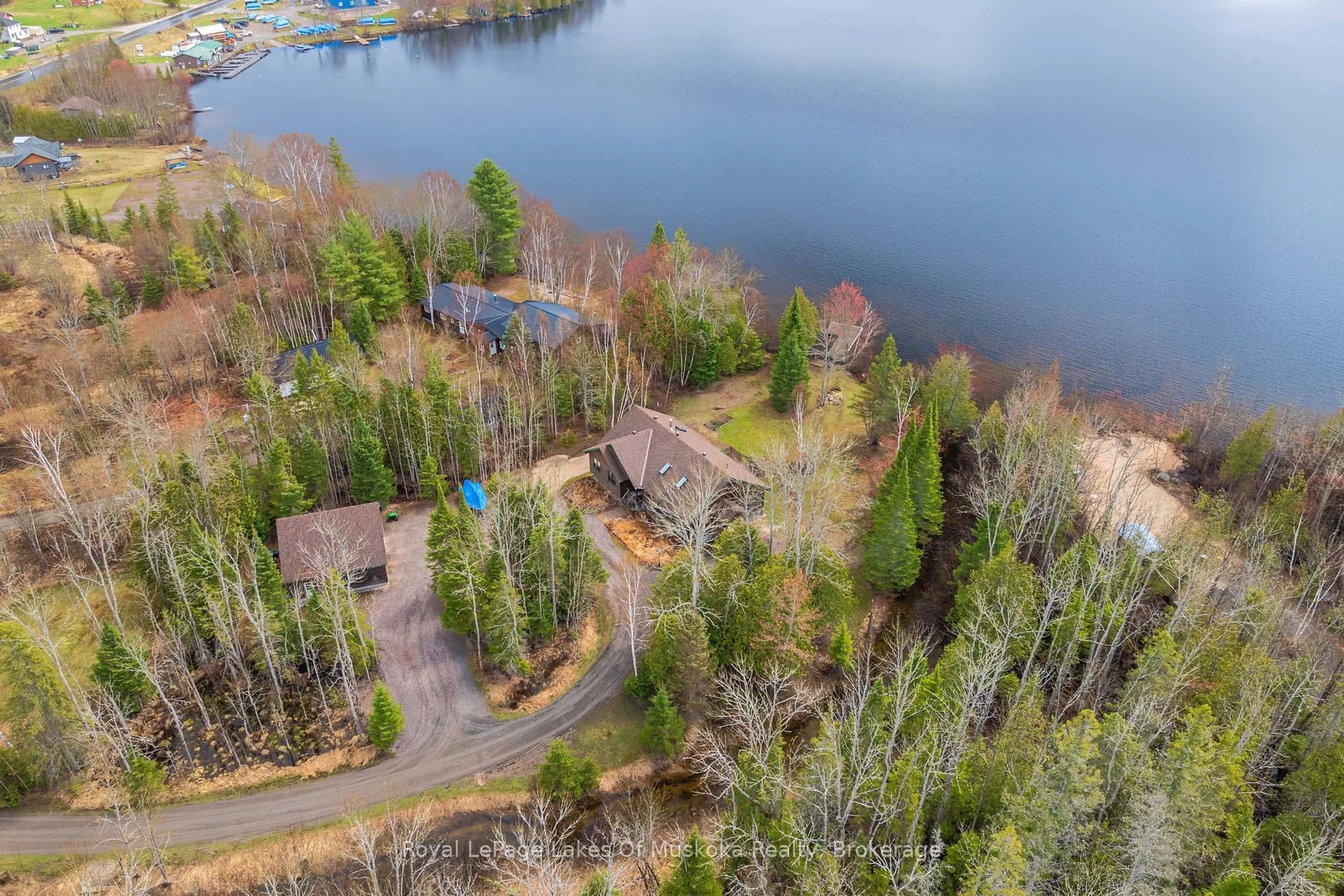 A pic from outside/outdoor area/front of a property/back of a property/a pic from drone, water/lake/river/ocean view for 3149 520 Highway, Magnetawan Ontario P0A 1P0