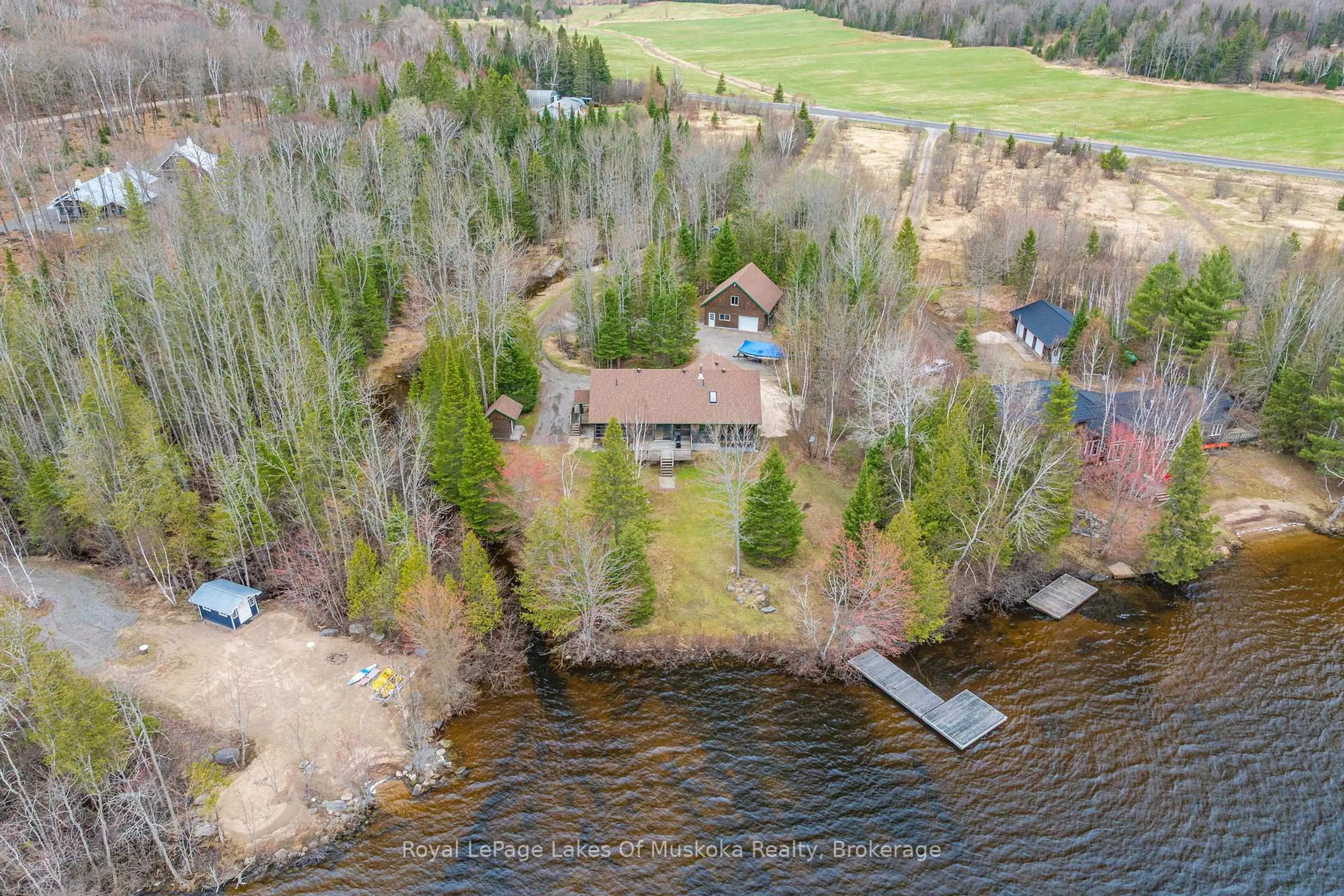 A pic from outside/outdoor area/front of a property/back of a property/a pic from drone, water/lake/river/ocean view for 3149 520 Highway, Magnetawan Ontario P0A 1P0