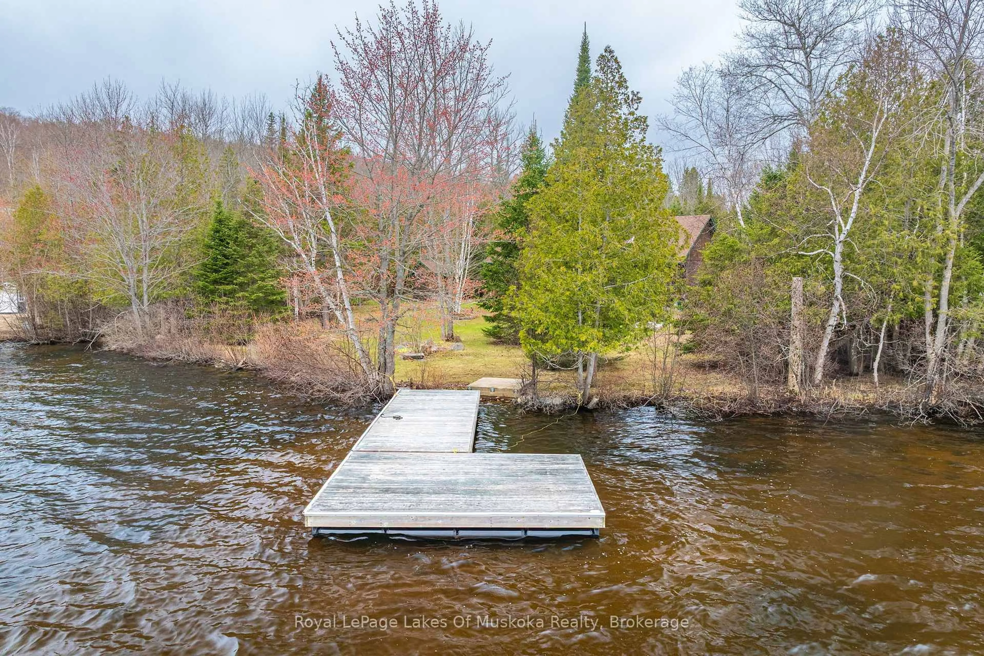 A pic from outside/outdoor area/front of a property/back of a property/a pic from drone, water/lake/river/ocean view for 3149 520 Highway, Magnetawan Ontario P0A 1P0