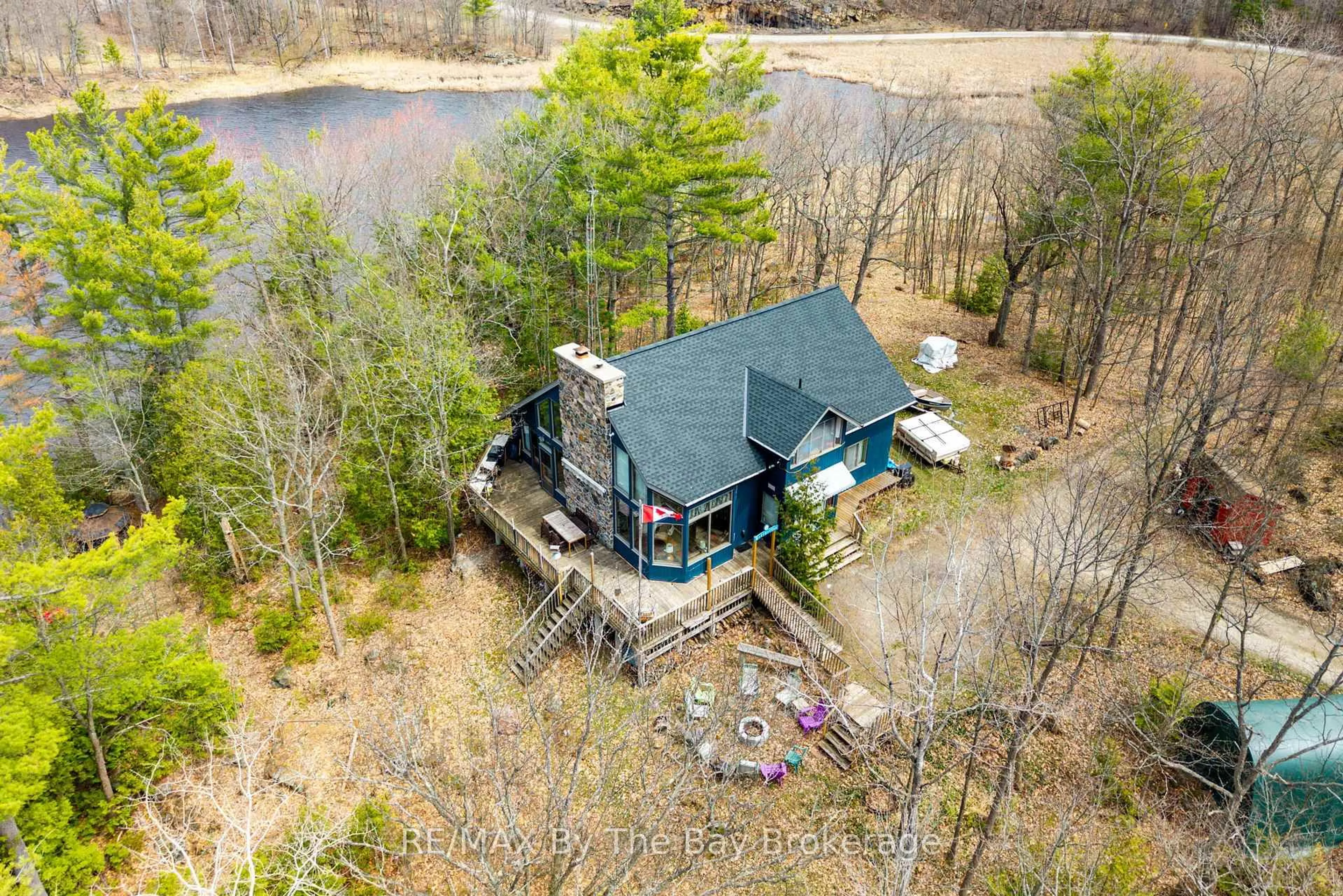 A pic from outside/outdoor area/front of a property/back of a property/a pic from drone, water/lake/river/ocean view for 609 South Bay Rd, Georgian Bay Ontario L0K 1S0