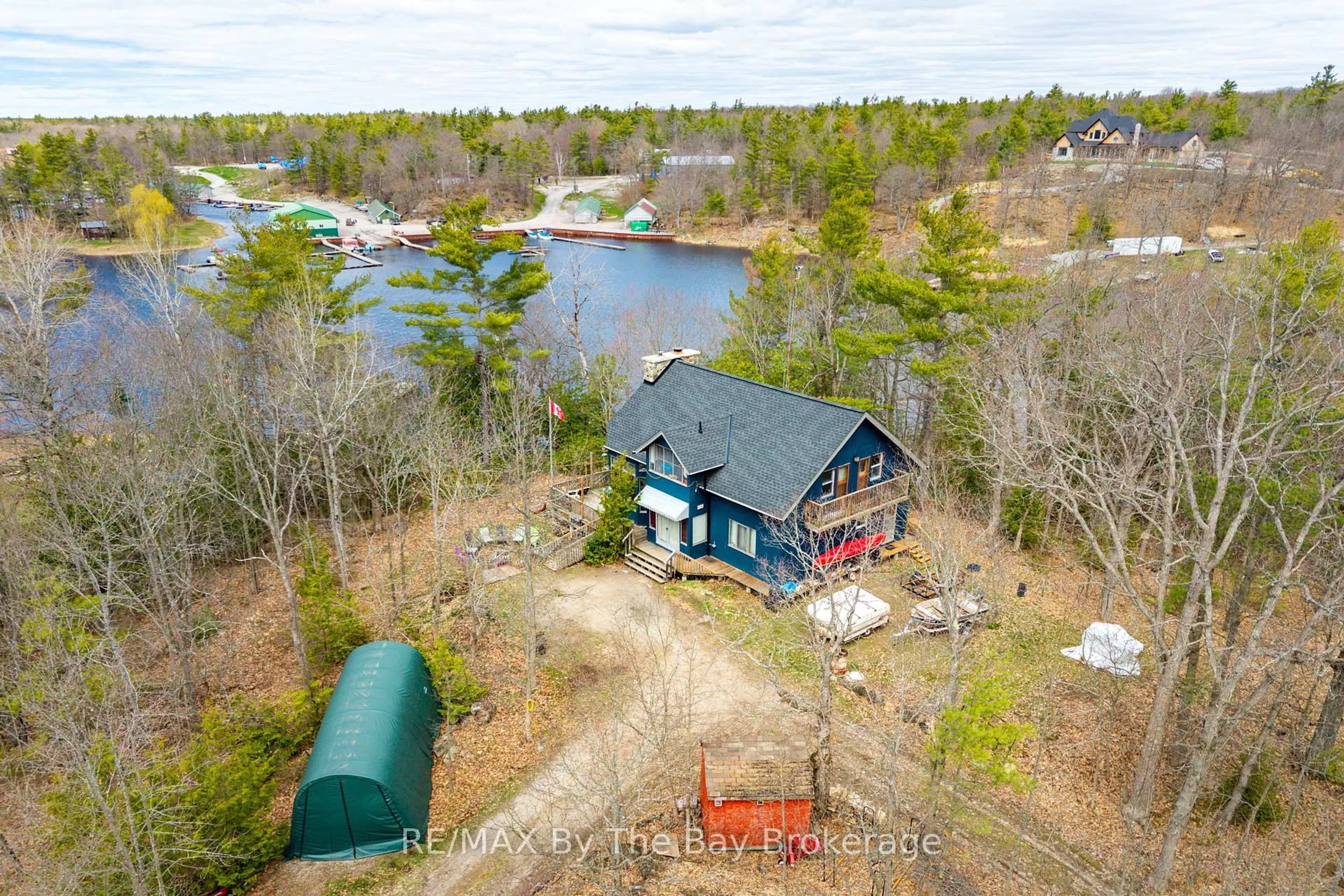 A pic from outside/outdoor area/front of a property/back of a property/a pic from drone, water/lake/river/ocean view for 609 South Bay Rd, Georgian Bay Ontario L0K 1S0