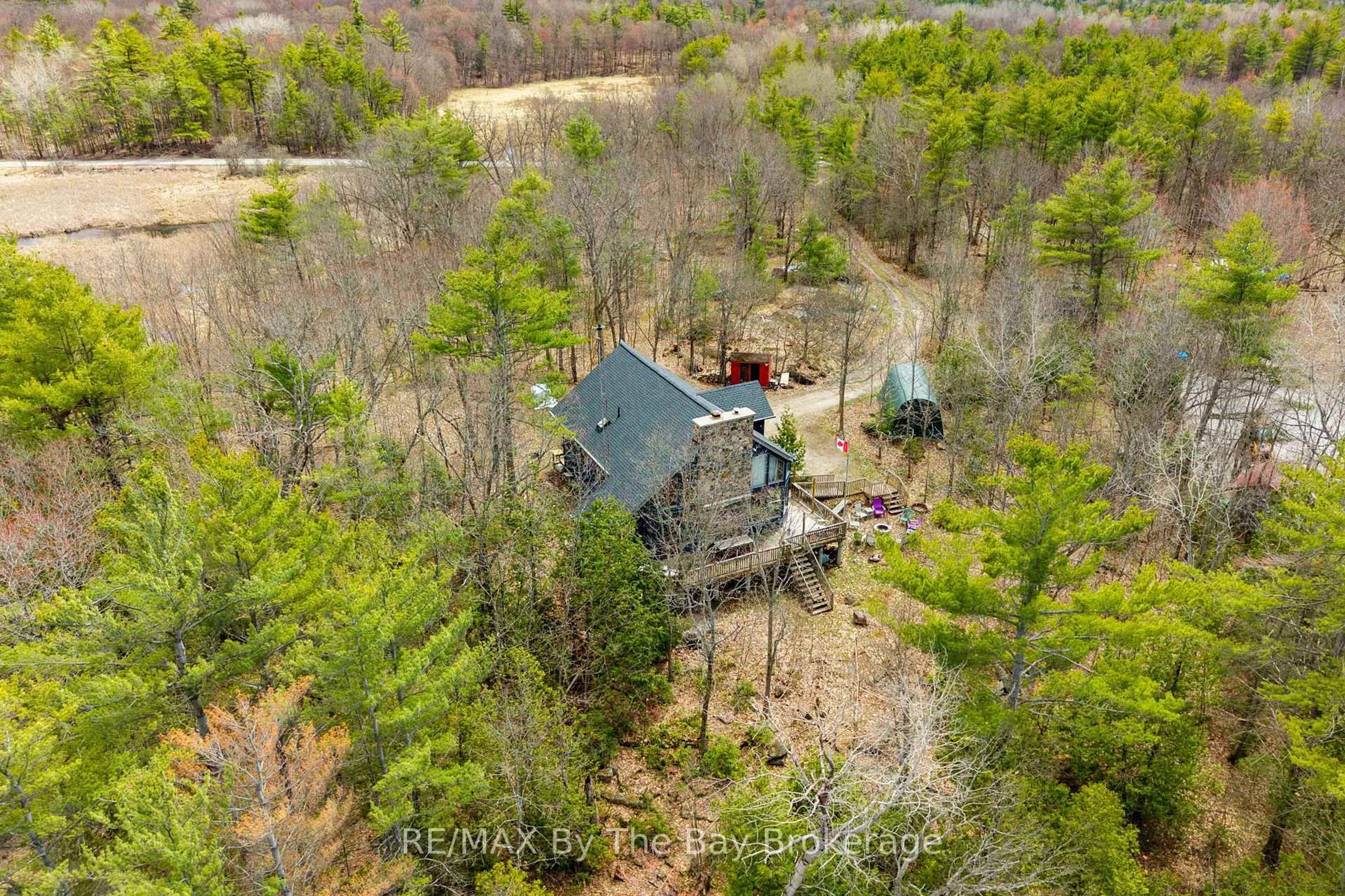 A pic from outside/outdoor area/front of a property/back of a property/a pic from drone, forest/trees view for 609 South Bay Rd, Georgian Bay Ontario L0K 1S0