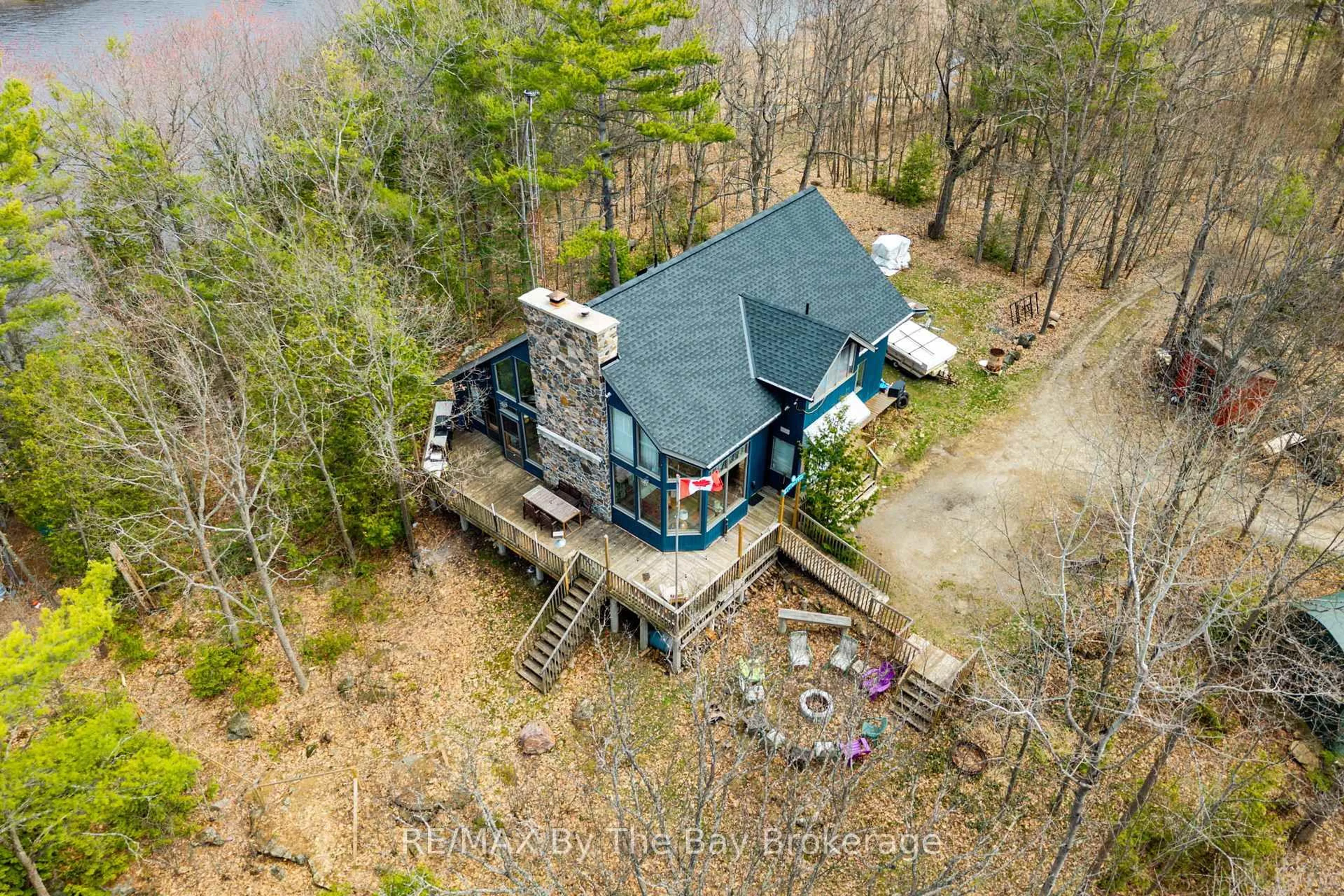 A pic from outside/outdoor area/front of a property/back of a property/a pic from drone, water/lake/river/ocean view for 609 South Bay Rd, Georgian Bay Ontario L0K 1S0