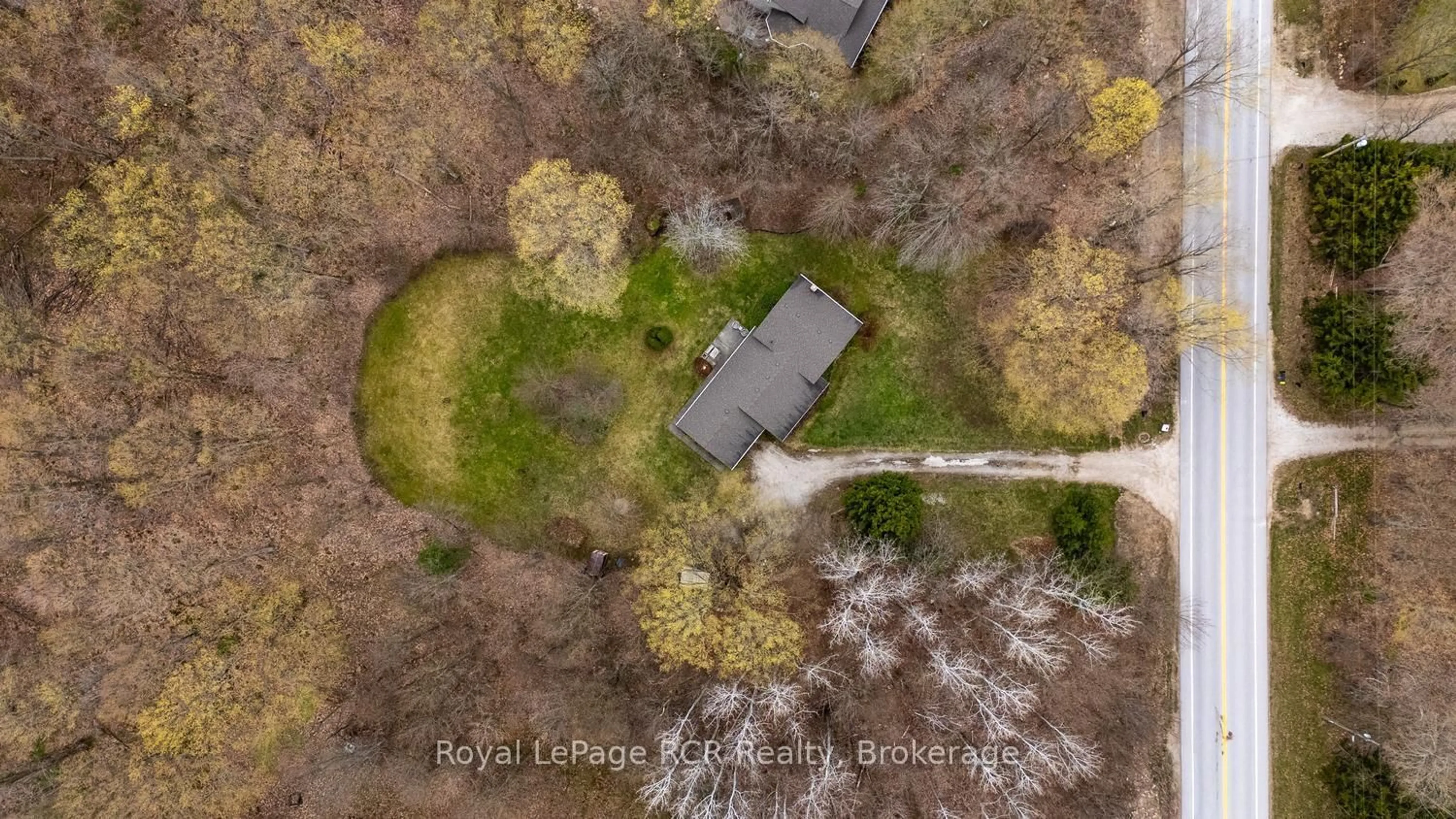 A pic from outside/outdoor area/front of a property/back of a property/a pic from drone, forest/trees view for 302088 grey rd 170 Rd, Georgian Bluffs Ontario N0H 2K0