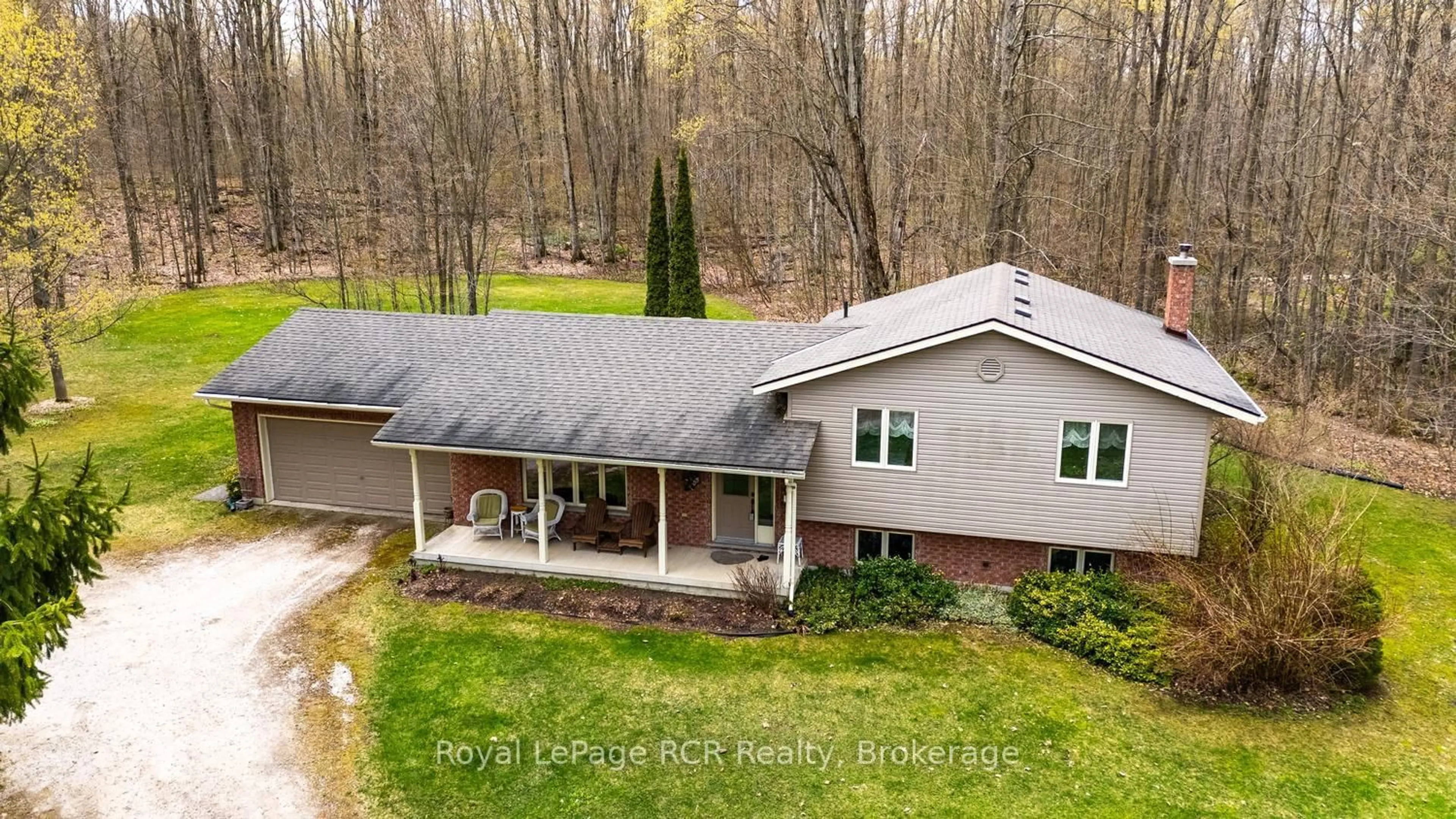 A pic from outside/outdoor area/front of a property/back of a property/a pic from drone, unknown for 302088 grey rd 170 Rd, Georgian Bluffs Ontario N0H 2K0