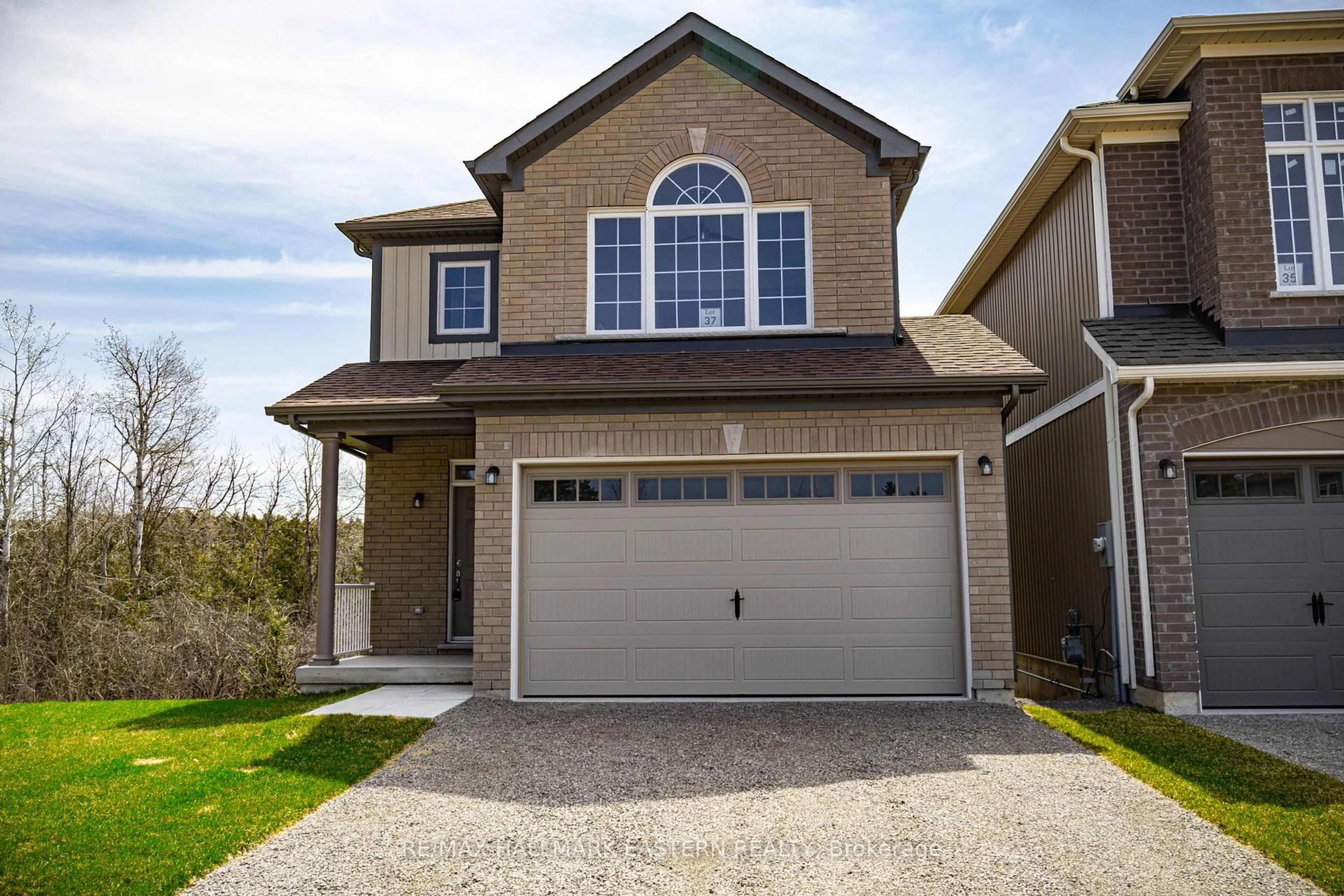 Home with vinyl exterior material, street for 37 COLDBROOK Dr, Cavan Monaghan Ontario L0A 1G0