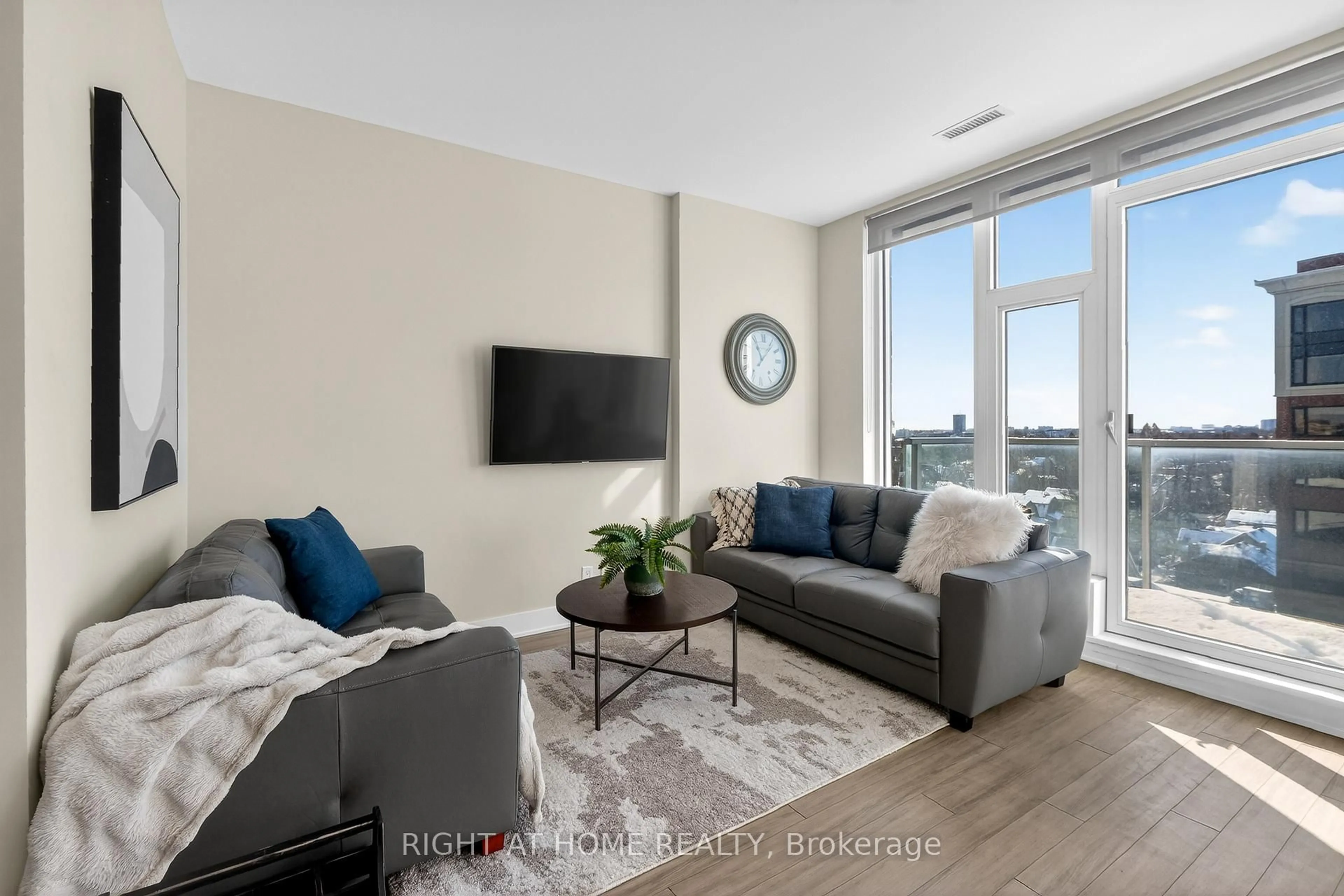 Living room with furniture, unknown for 118 Holmwood Ave #806, Ottawa Ontario K1S 5J5