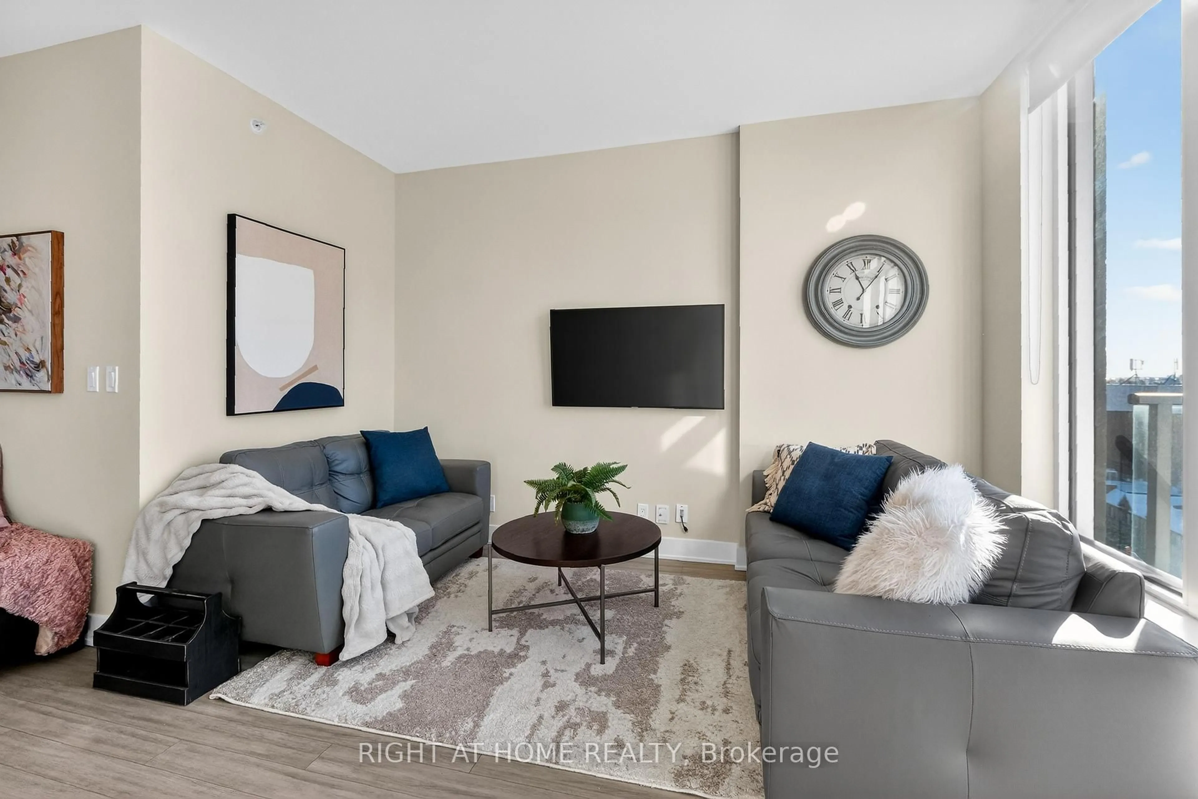 Living room with furniture, unknown for 118 Holmwood Ave #806, Ottawa Ontario K1S 5J5