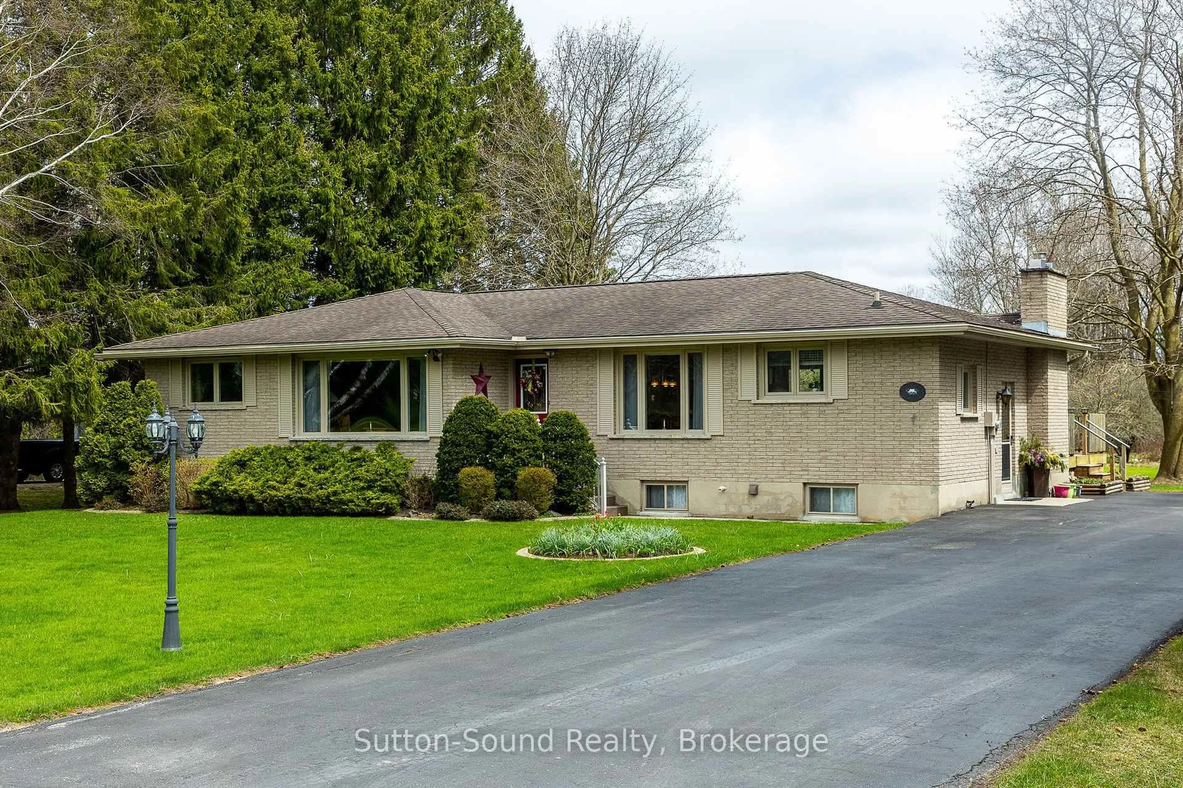 Home with vinyl exterior material, street for 335 Park St, Georgian Bluffs Ontario N4K 6V5