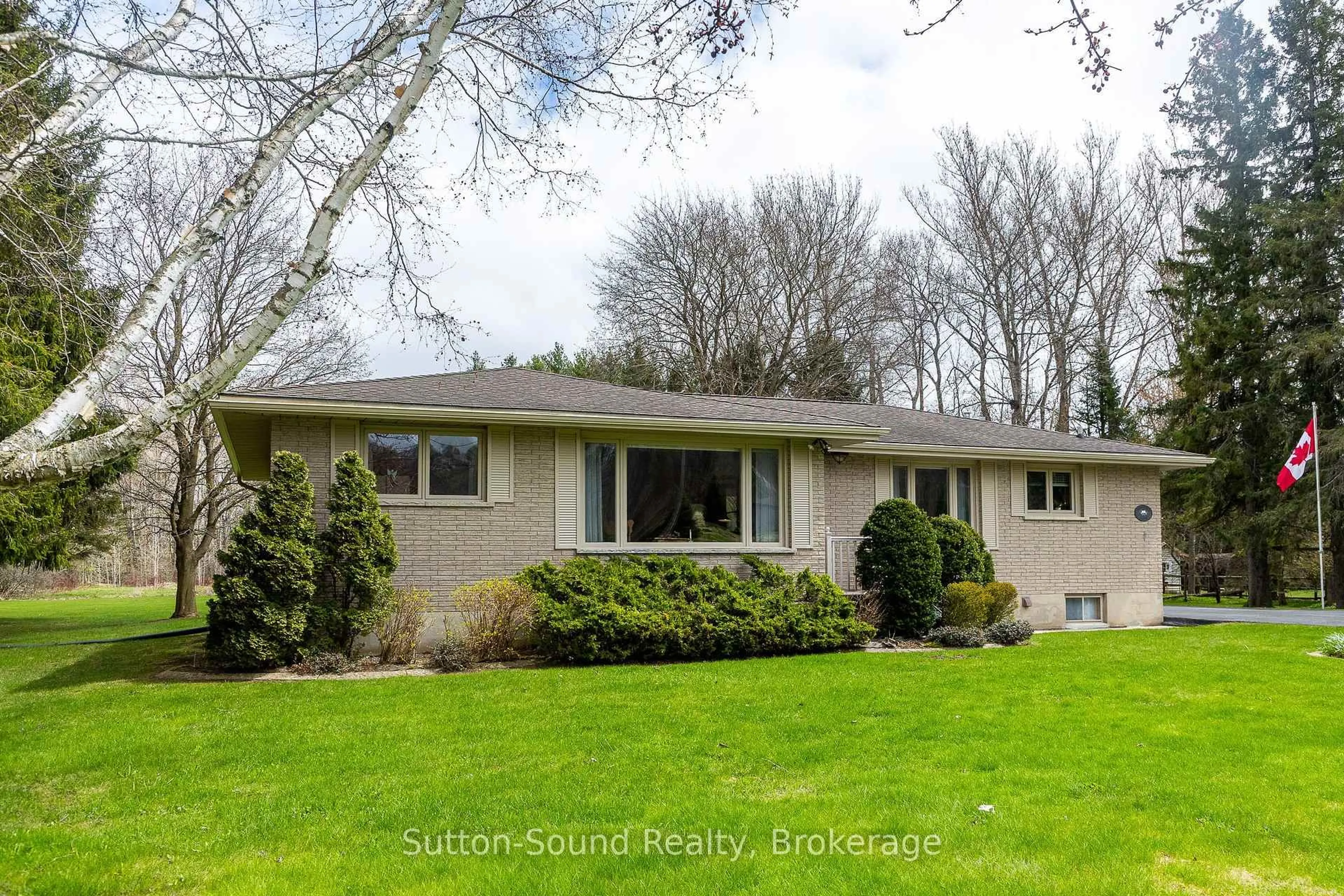 Home with vinyl exterior material, street for 335 Park St, Georgian Bluffs Ontario N4K 6V5