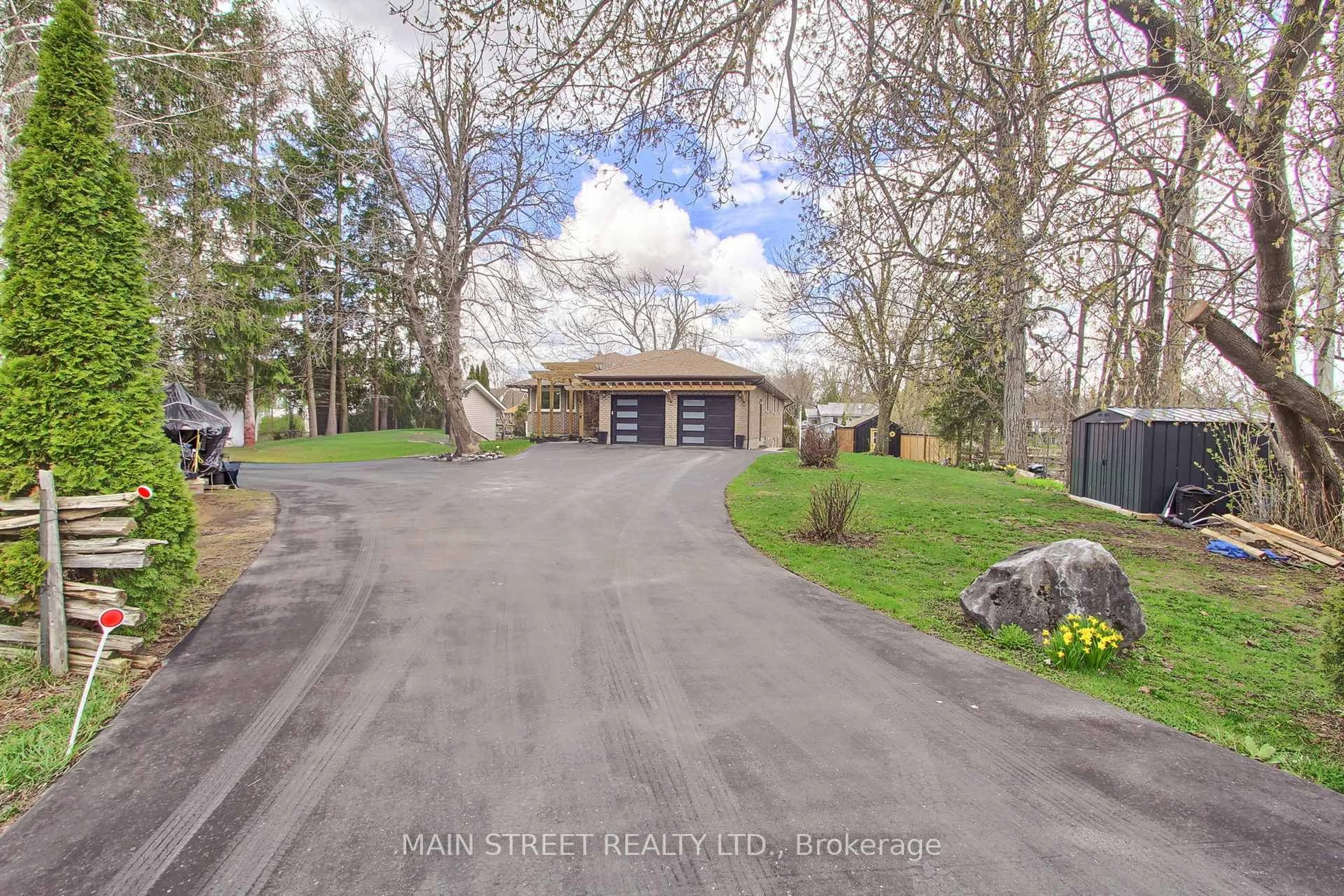 A pic from outside/outdoor area/front of a property/back of a property/a pic from drone, street for 24 Maple Grove Rd, Kawartha Lakes Ontario K9V 4R6