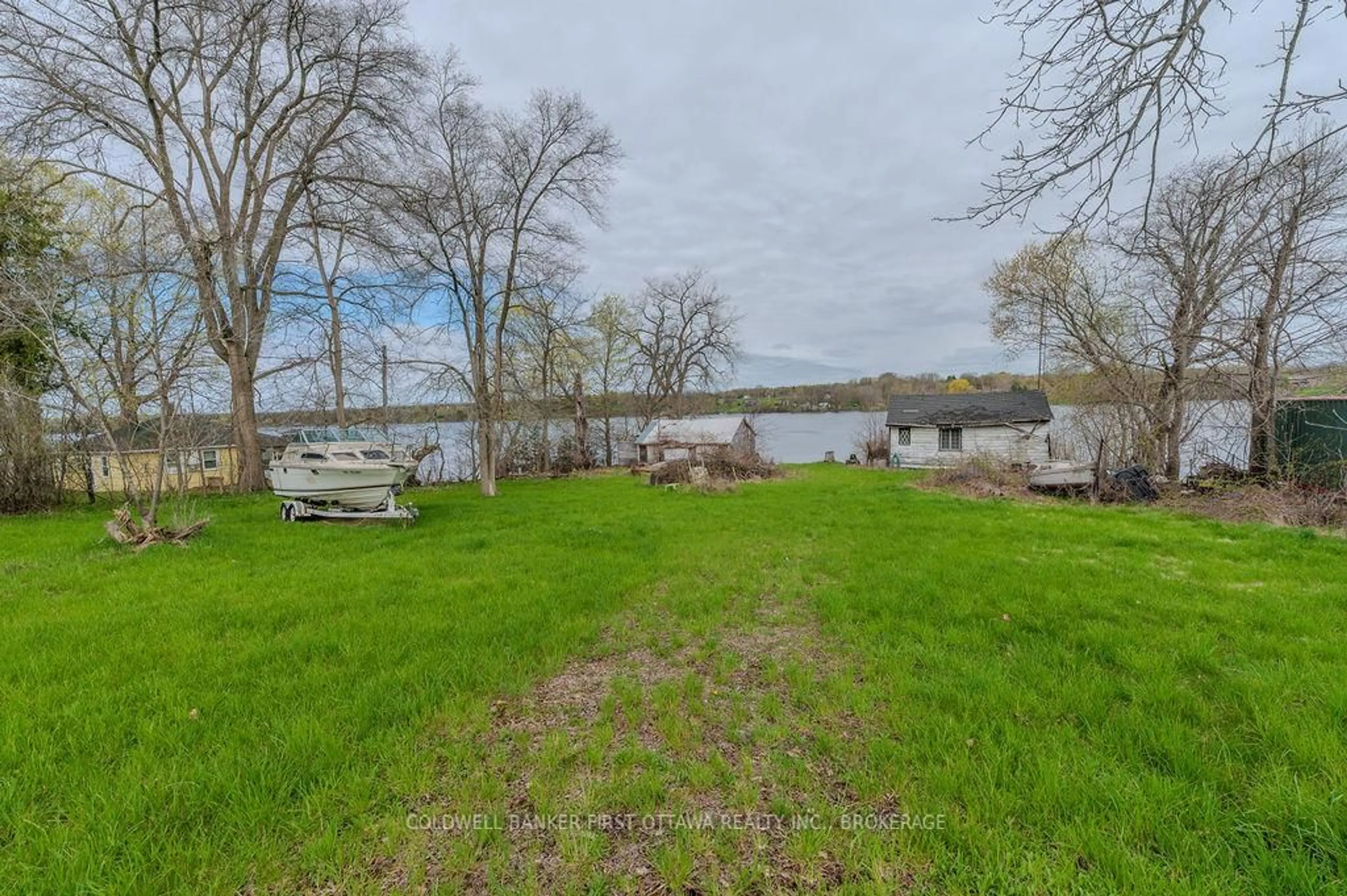 A pic from outside/outdoor area/front of a property/back of a property/a pic from drone, water/lake/river/ocean view for 1285 South Shore Rd, Napanee Ontario K7R 3K7