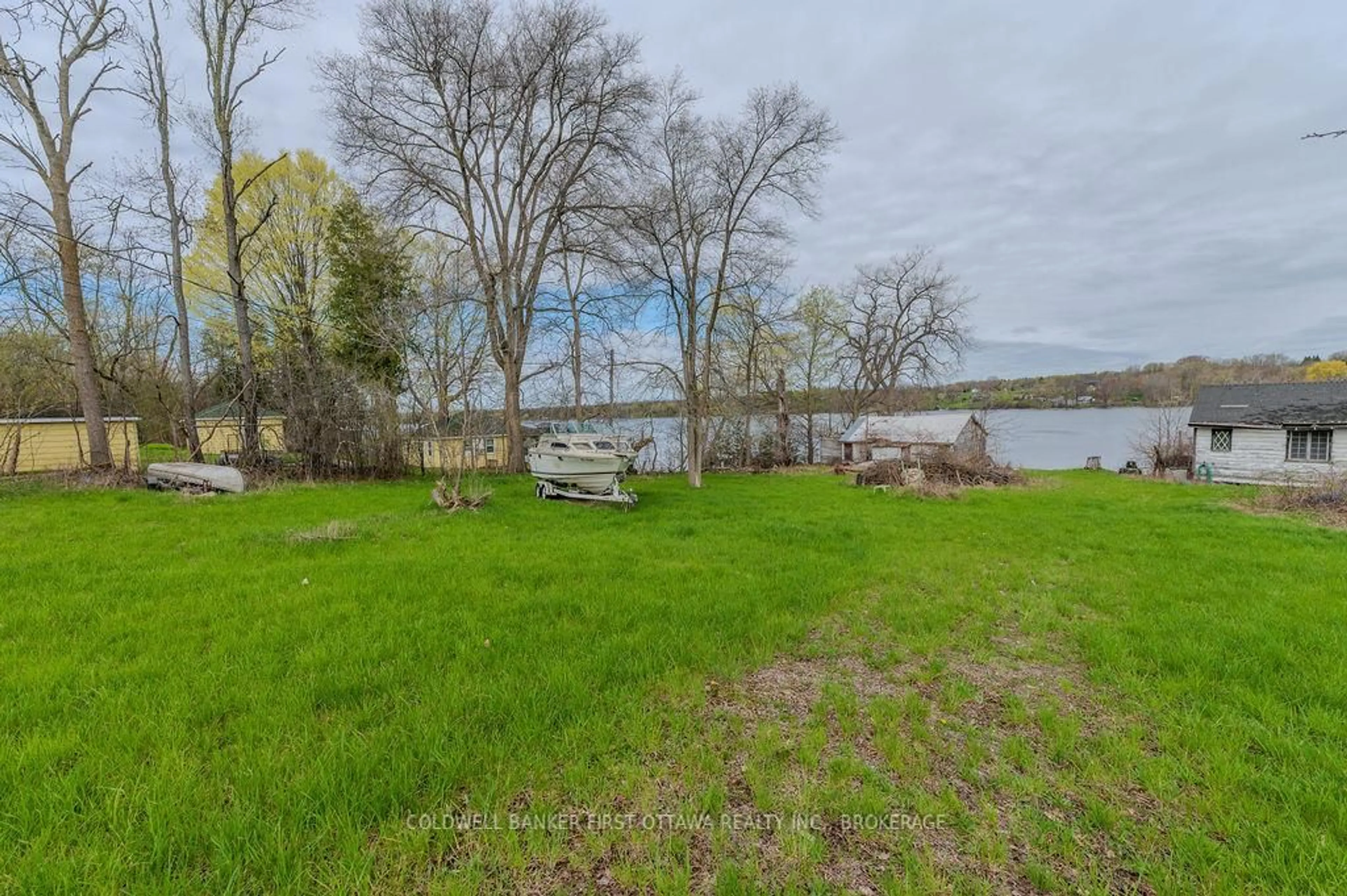 A pic from outside/outdoor area/front of a property/back of a property/a pic from drone, water/lake/river/ocean view for 1285 South Shore Rd, Napanee Ontario K7R 3K7
