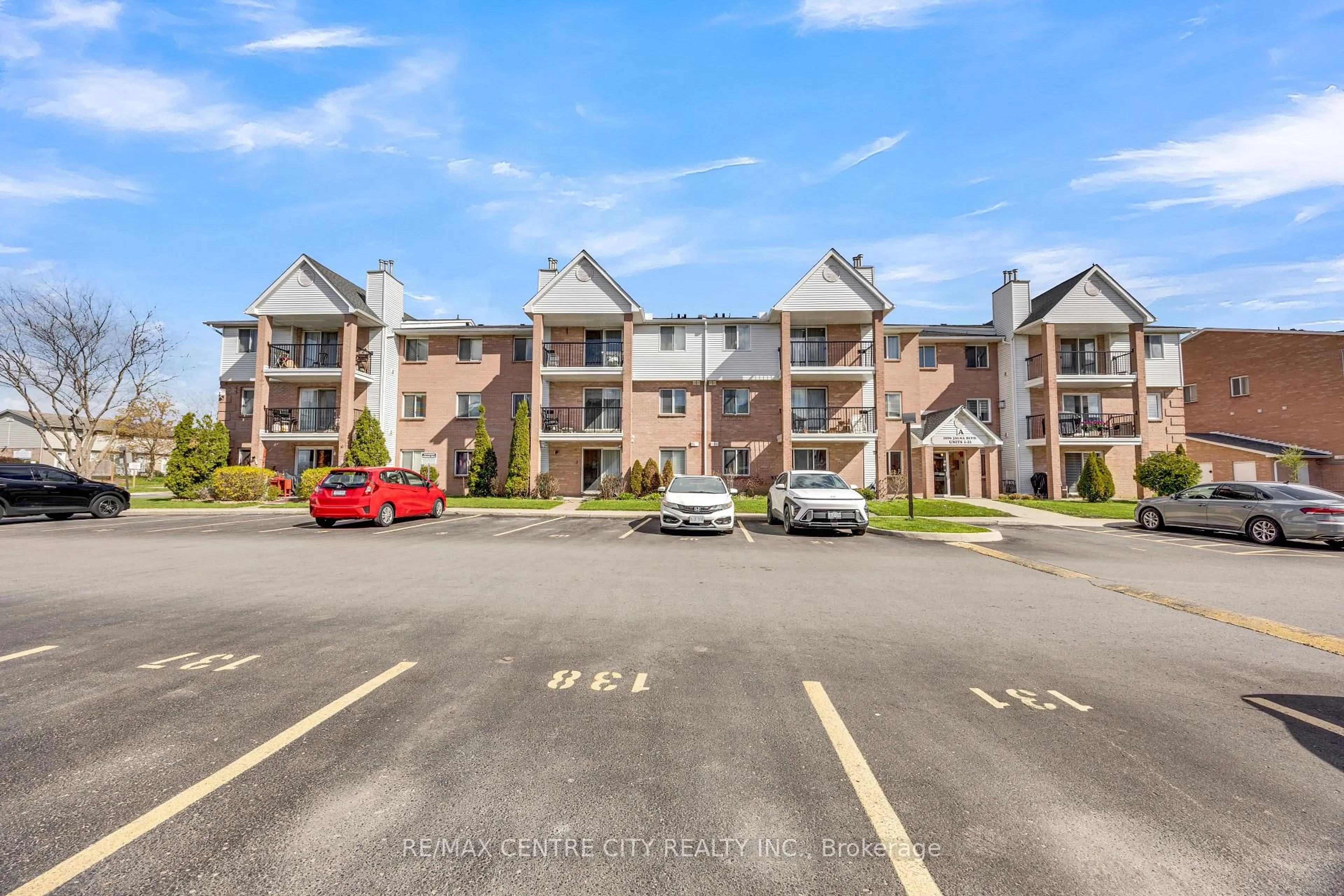 A pic from outside/outdoor area/front of a property/back of a property/a pic from drone, mountain view for 1096 Jalna Blvd #9, London South Ontario N6E 3B8