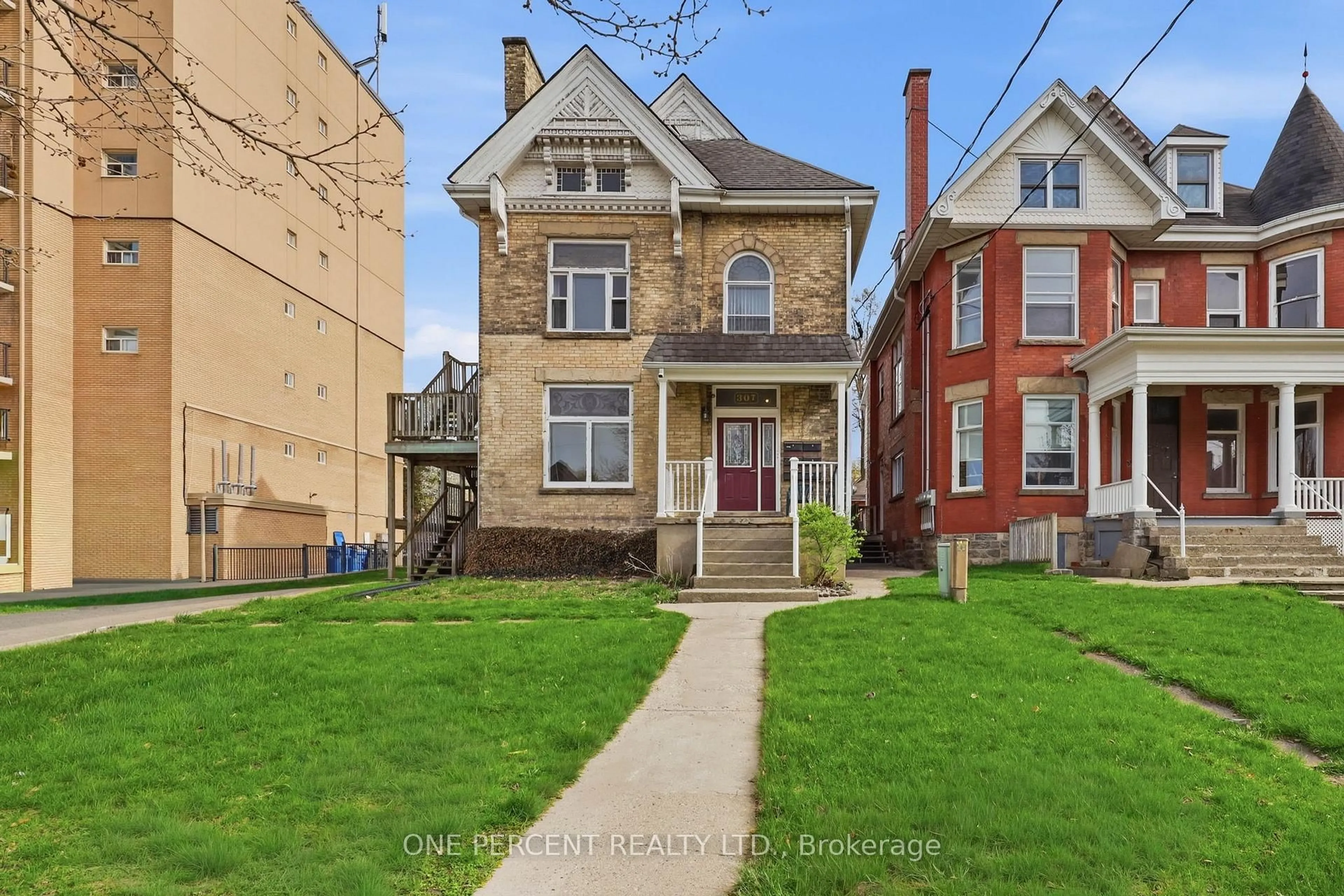 Home with brick exterior material, street for 307 Central Ave, London East Ontario N6B 2C9