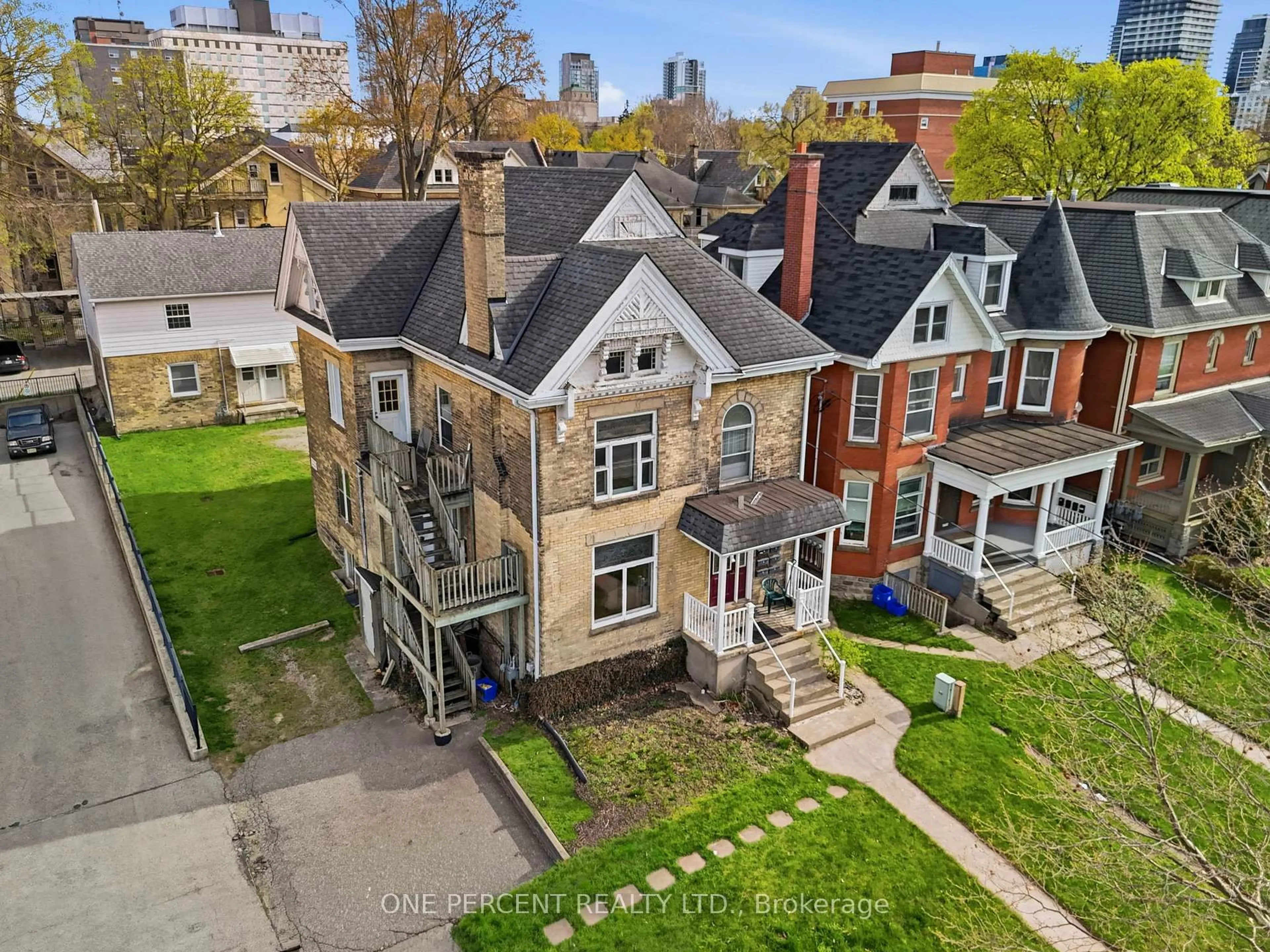 A pic from outside/outdoor area/front of a property/back of a property/a pic from drone, street for 307 Central Ave, London East Ontario N6B 2C9