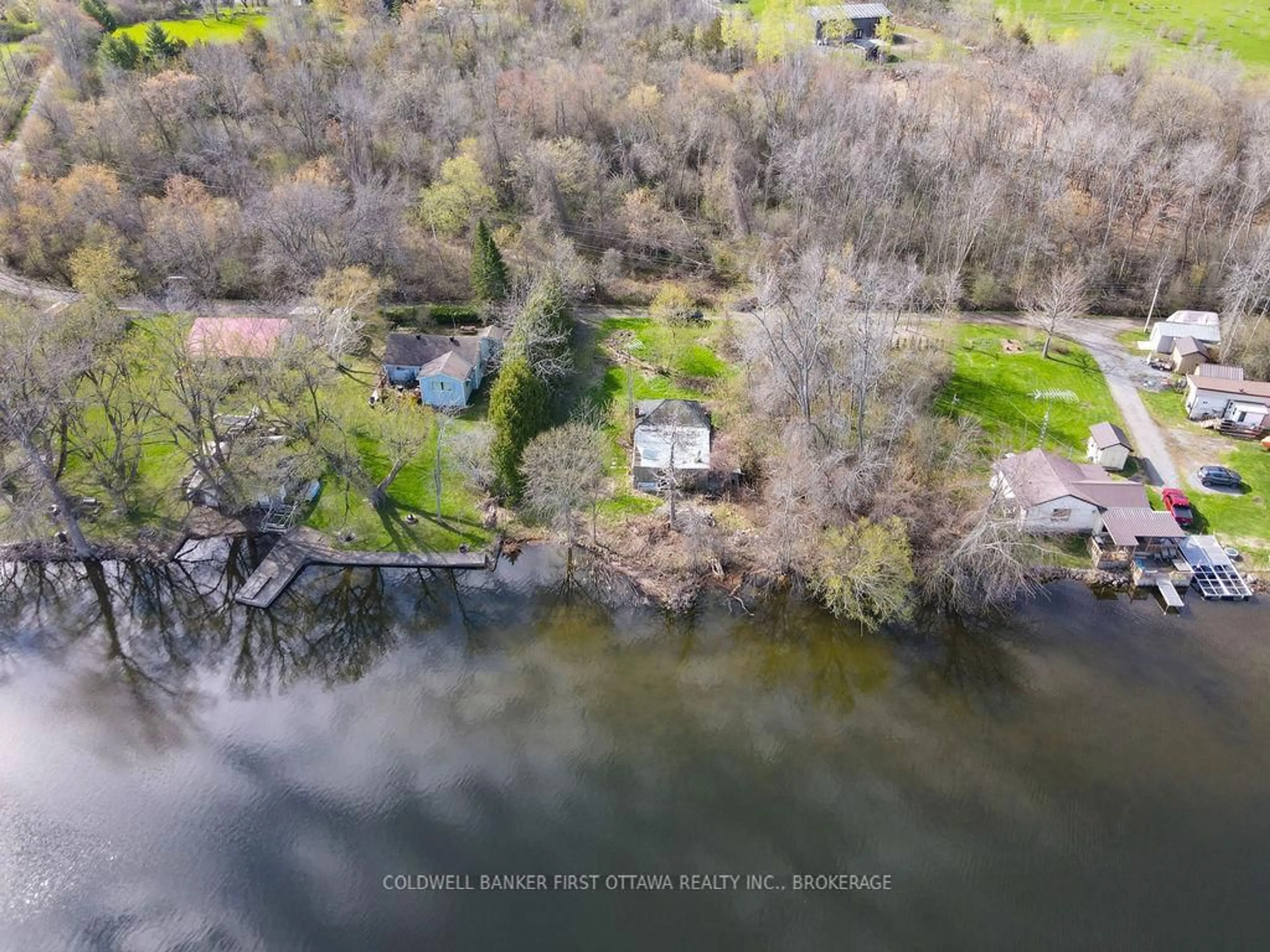 A pic from outside/outdoor area/front of a property/back of a property/a pic from drone, water/lake/river/ocean view for 2868C County Rd 8, Napanee Ontario K7R 3K7