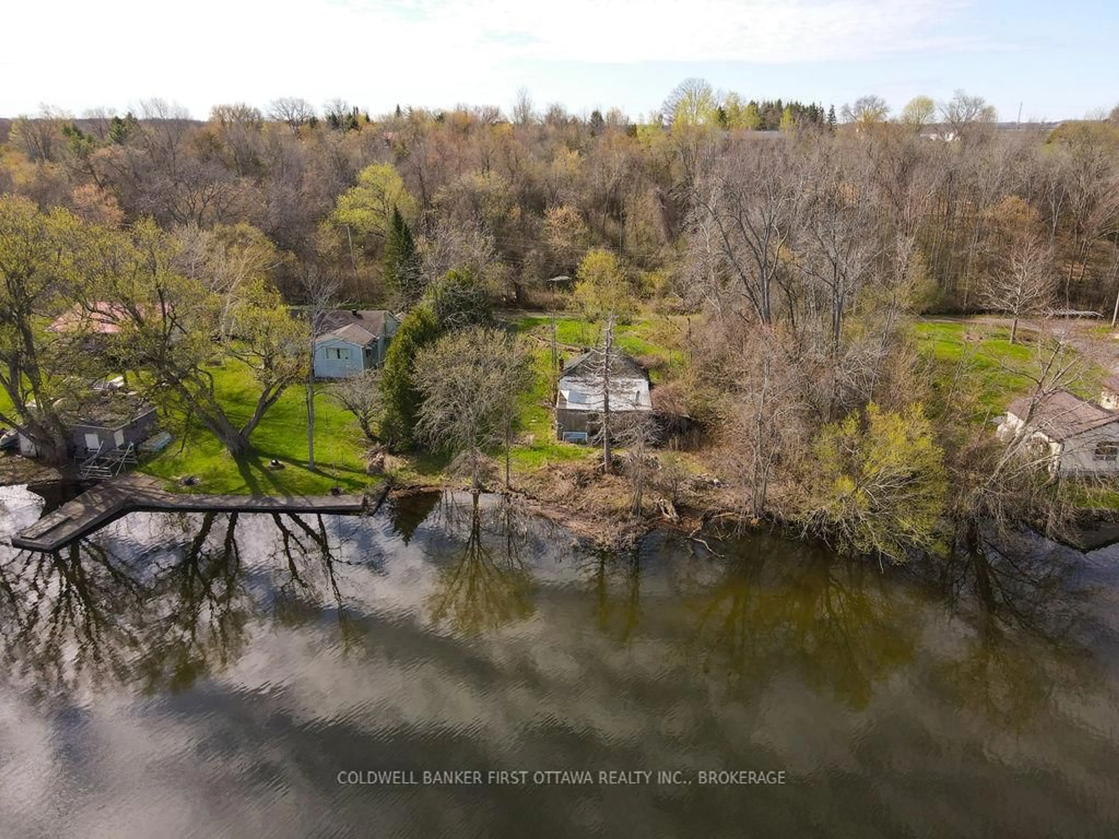 A pic from outside/outdoor area/front of a property/back of a property/a pic from drone, water/lake/river/ocean view for 2868C County Rd 8, Napanee Ontario K7R 3K7