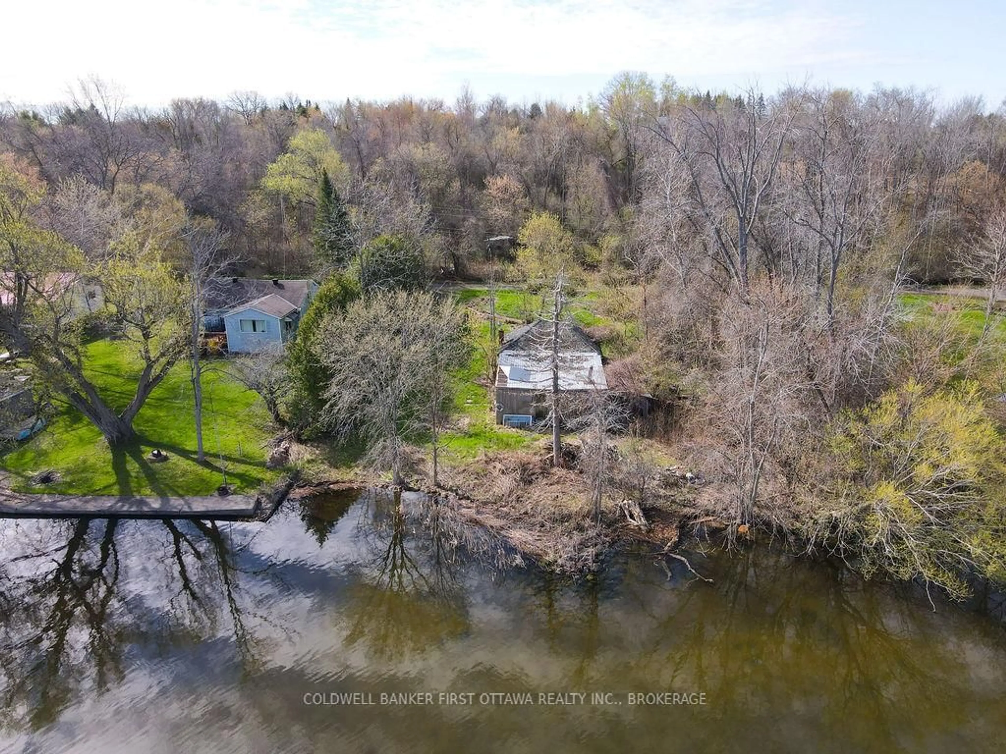 A pic from outside/outdoor area/front of a property/back of a property/a pic from drone, water/lake/river/ocean view for 2868C County Rd 8, Napanee Ontario K7R 3K7