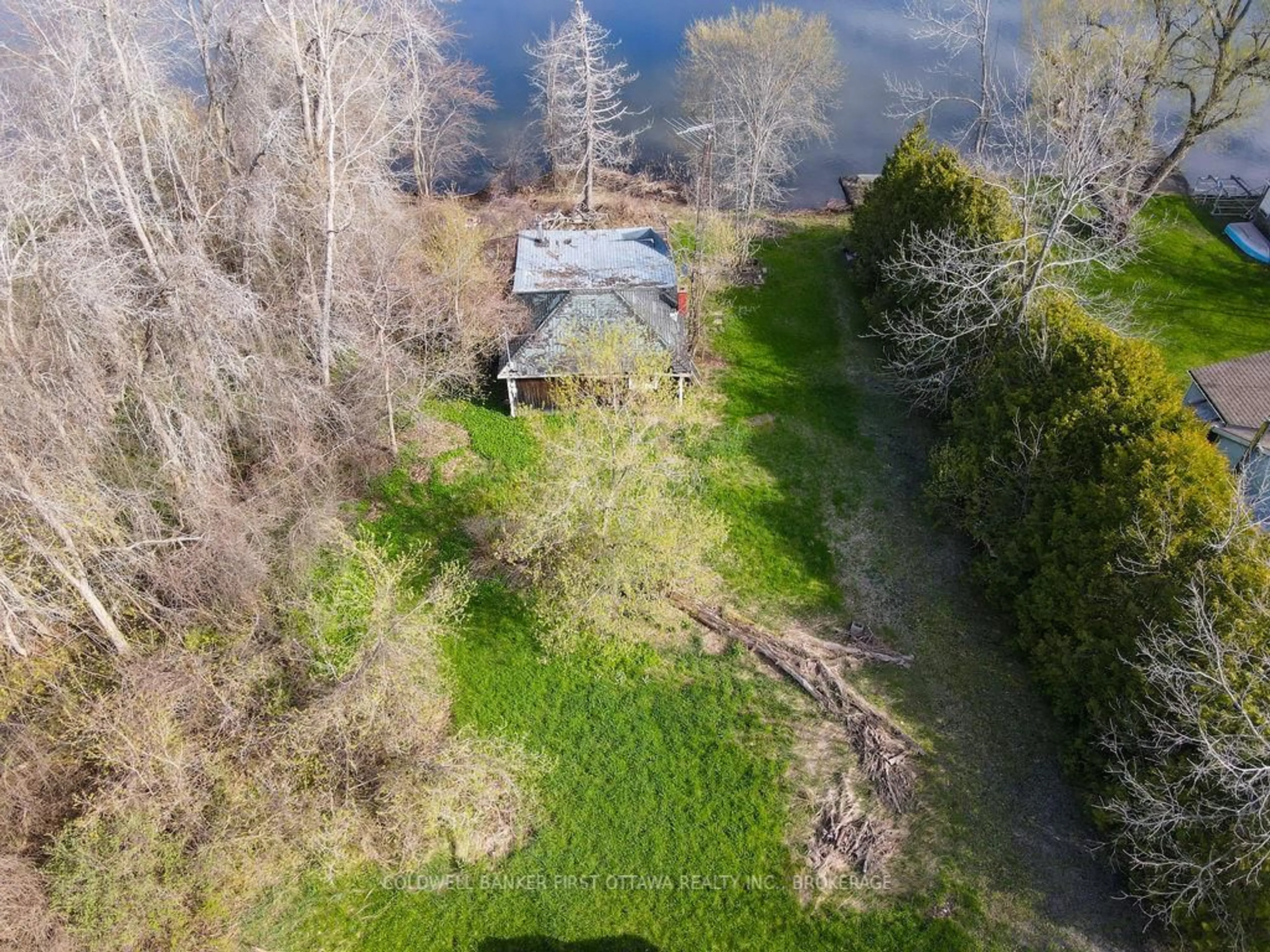 A pic from outside/outdoor area/front of a property/back of a property/a pic from drone, water/lake/river/ocean view for 2868C County Rd 8, Napanee Ontario K7R 3K7