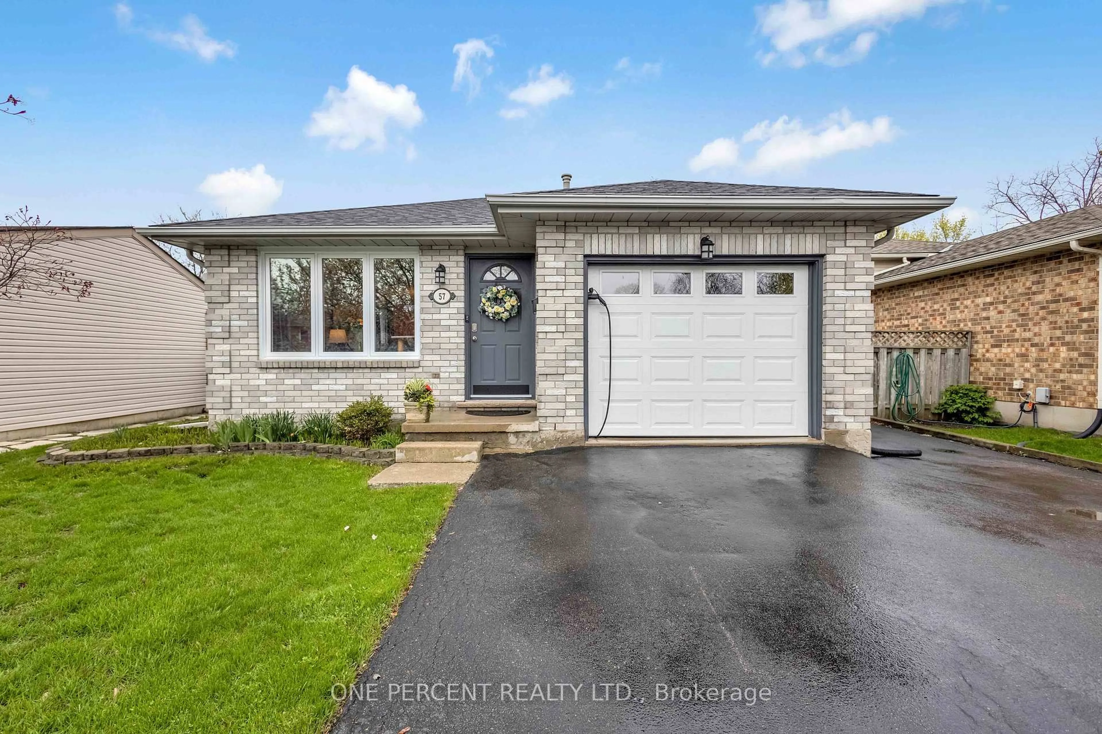 Home with brick exterior material, street for 57 Coxwell Cres, Brantford Ontario N3P 1P5