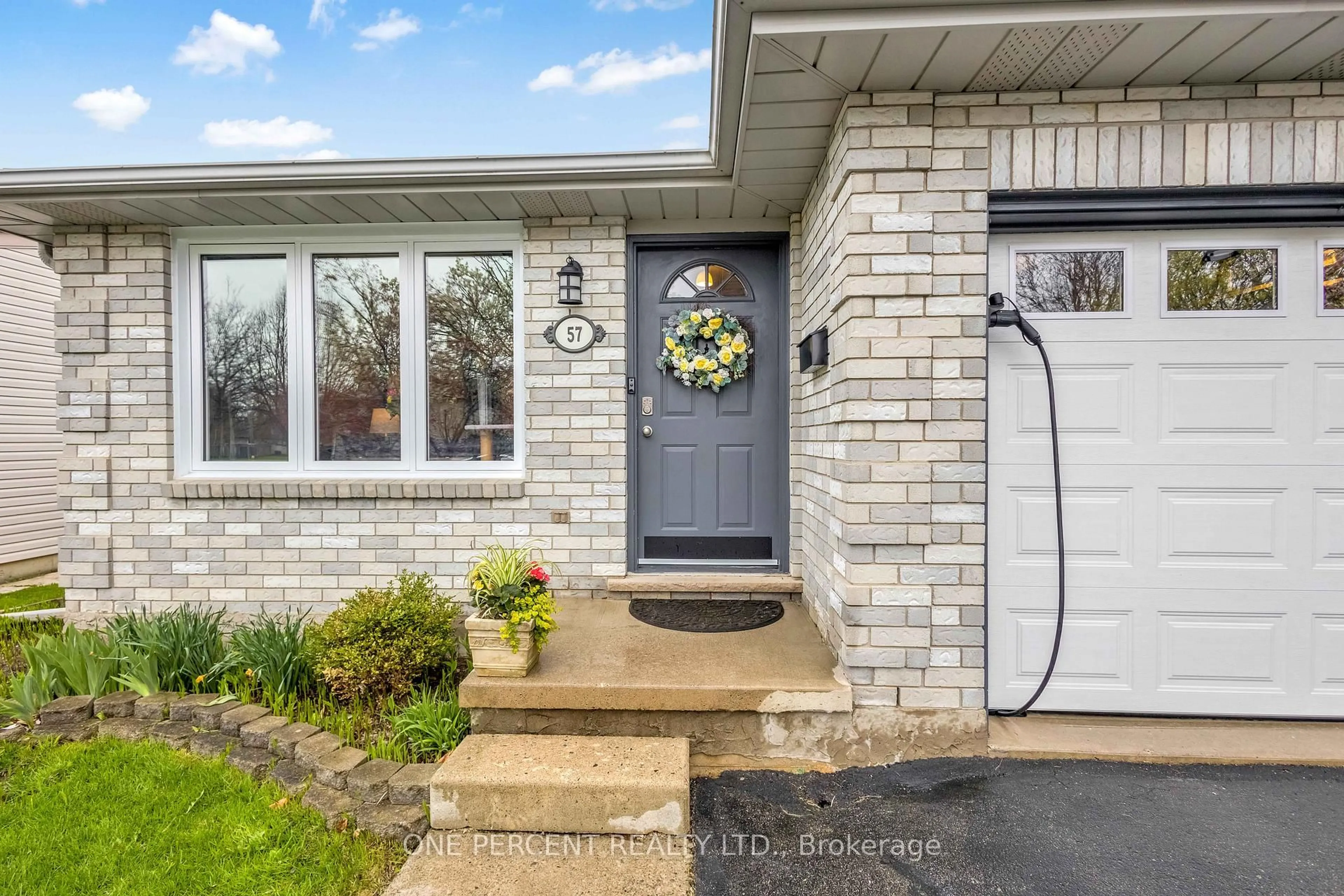 Home with brick exterior material, street for 57 Coxwell Cres, Brantford Ontario N3P 1P5