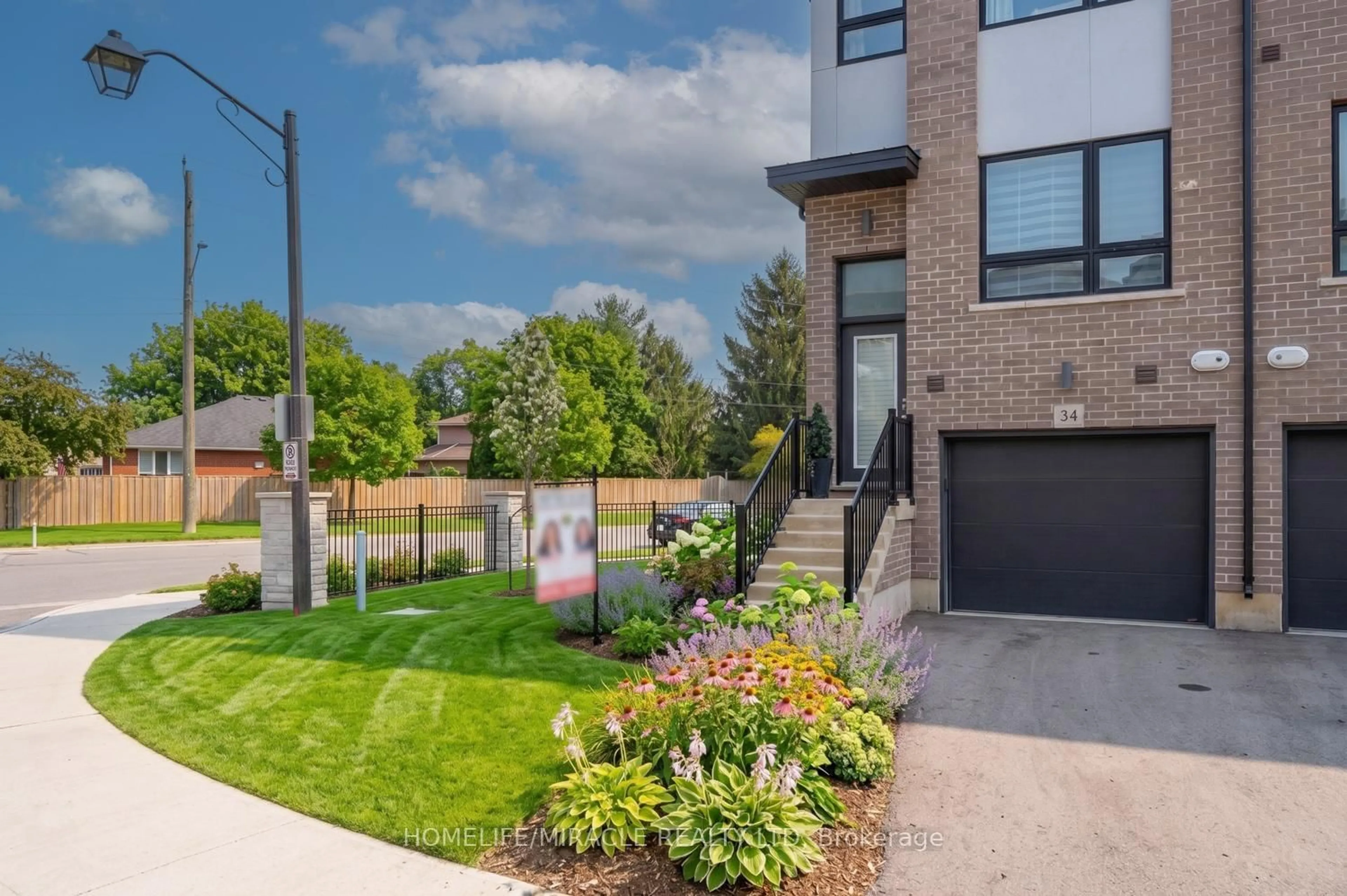 Home with brick exterior material, street for 720 Grey St #34, Brantford Ontario N3S 0K2