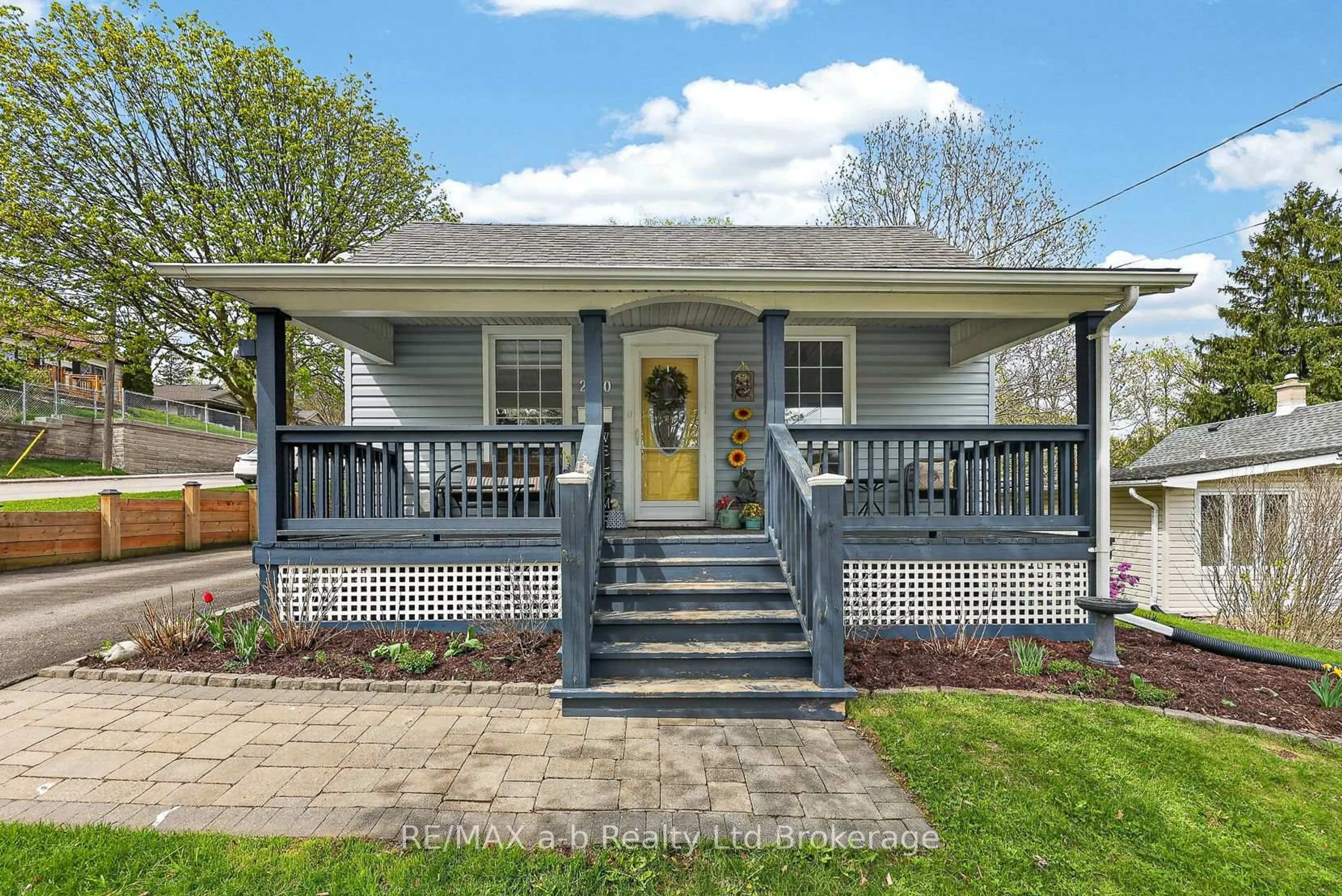 Home with vinyl exterior material, street for 210 Russell St, Woodstock Ontario N4S 2Z2