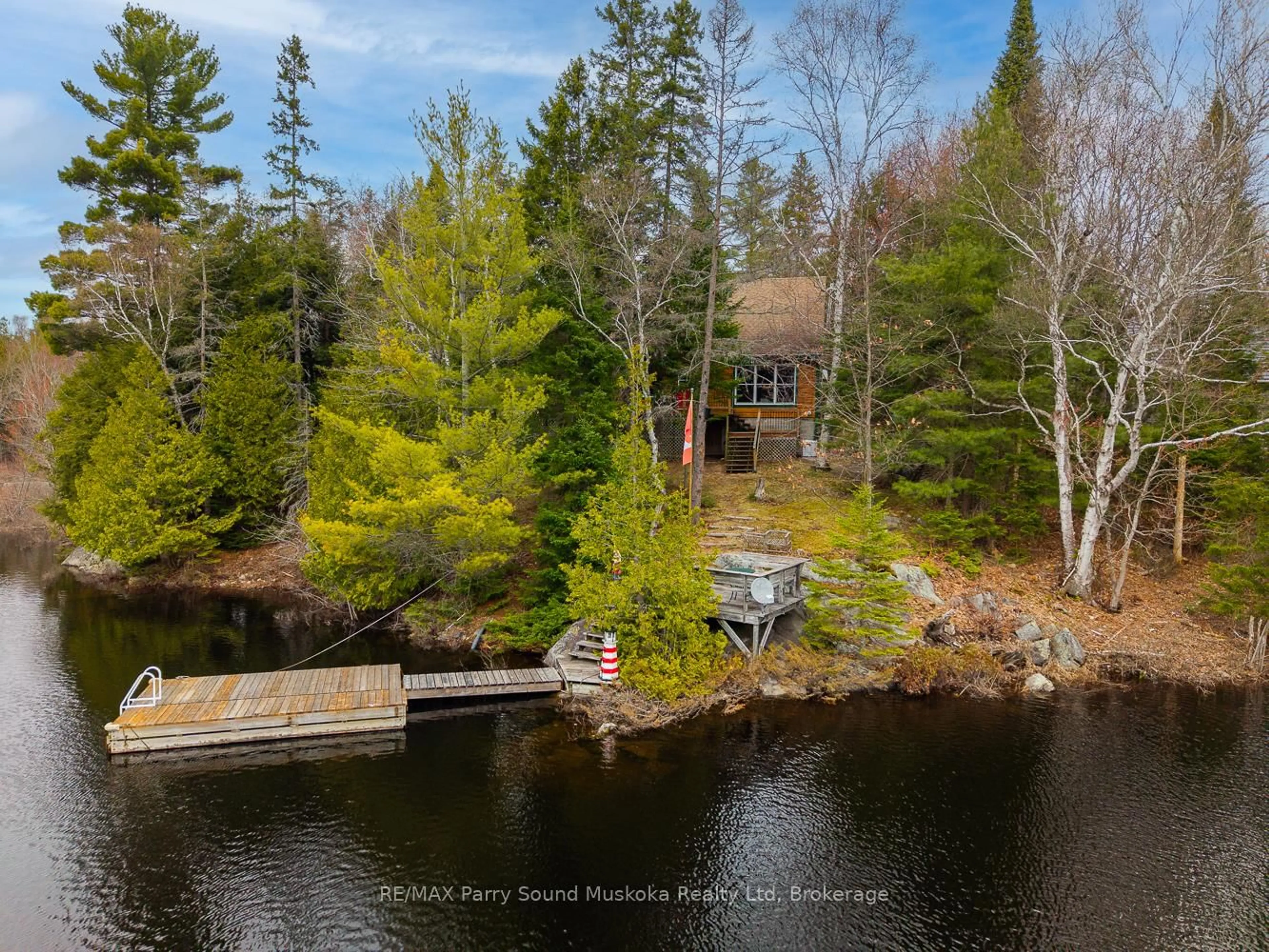 A pic from outside/outdoor area/front of a property/back of a property/a pic from drone, water/lake/river/ocean view for 18 Smokey Rd, Whitestone Ontario P0A 1G0