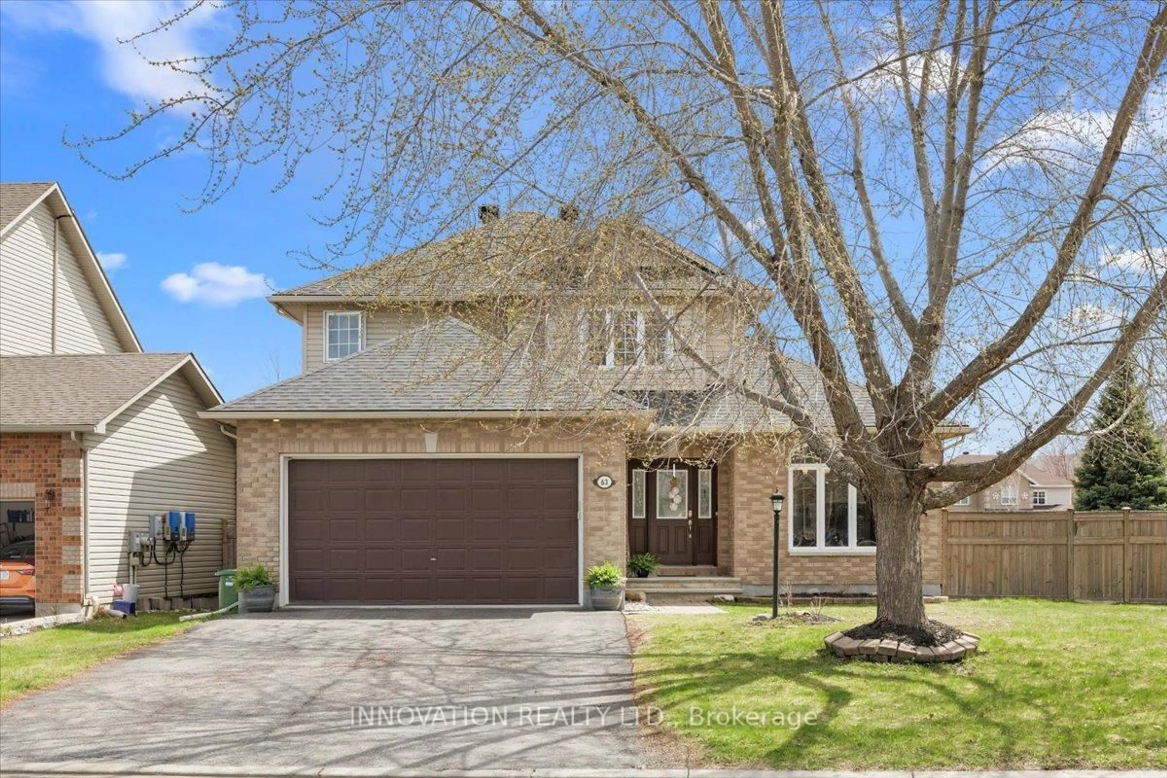 Home with brick exterior material, street for 63 Cinnabar Way, Ottawa Ontario K2S 1Y9