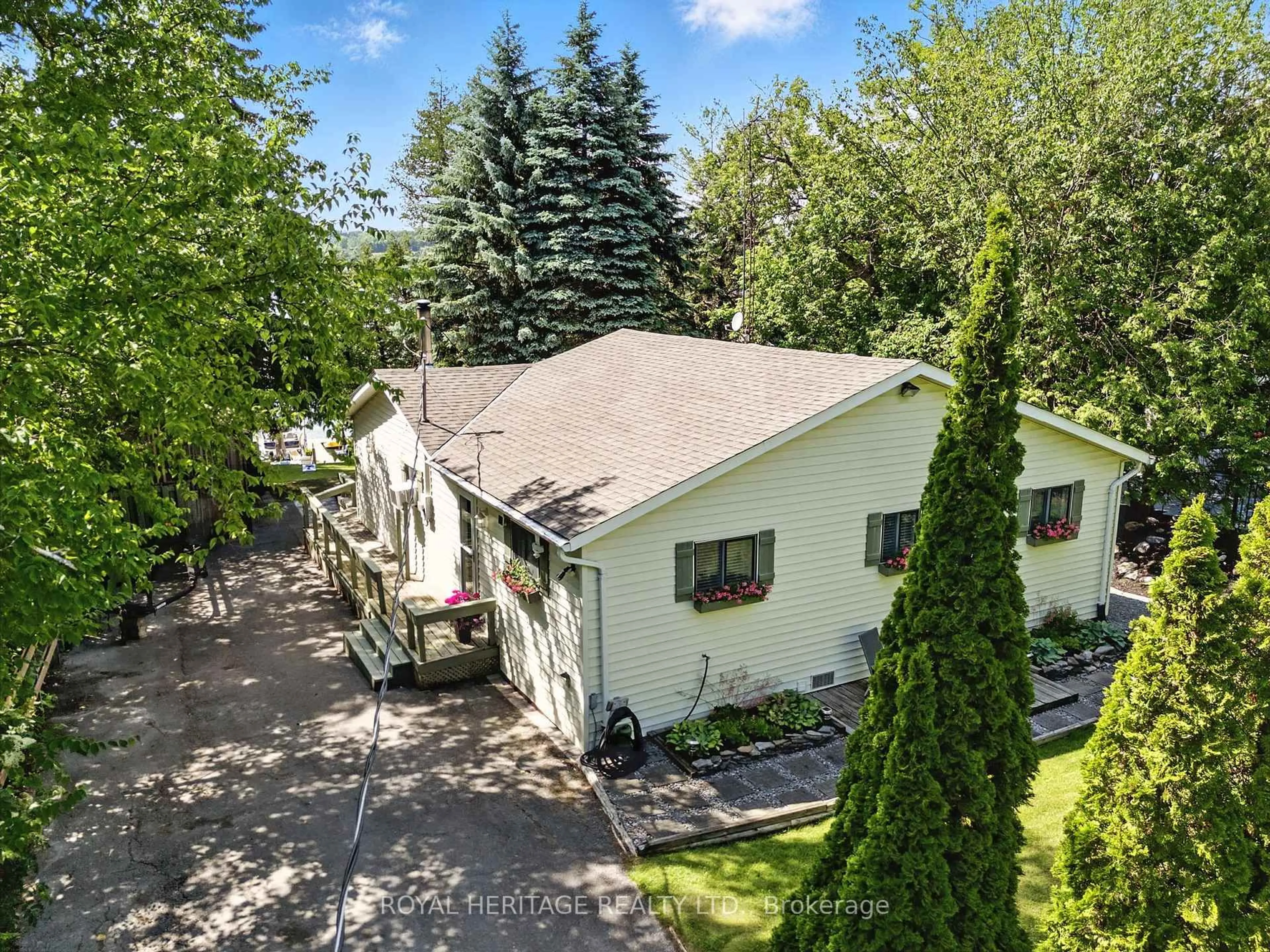 A pic from outside/outdoor area/front of a property/back of a property/a pic from drone, street for 42 Reddick Rd, Cramahe Ontario K0K 1S0