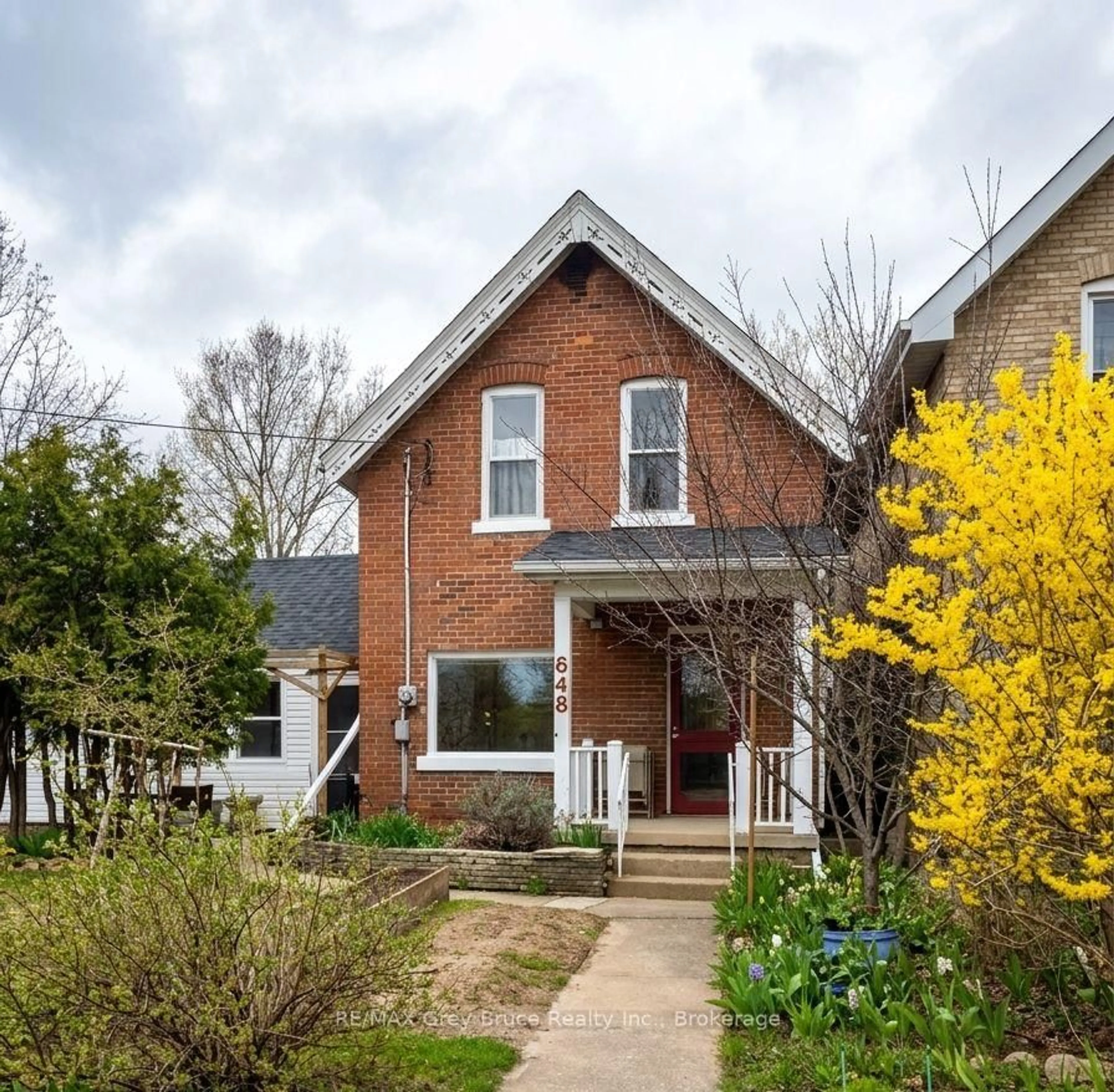 Home with brick exterior material, street for 648 9th St, Owen Sound Ontario N4K 1P7