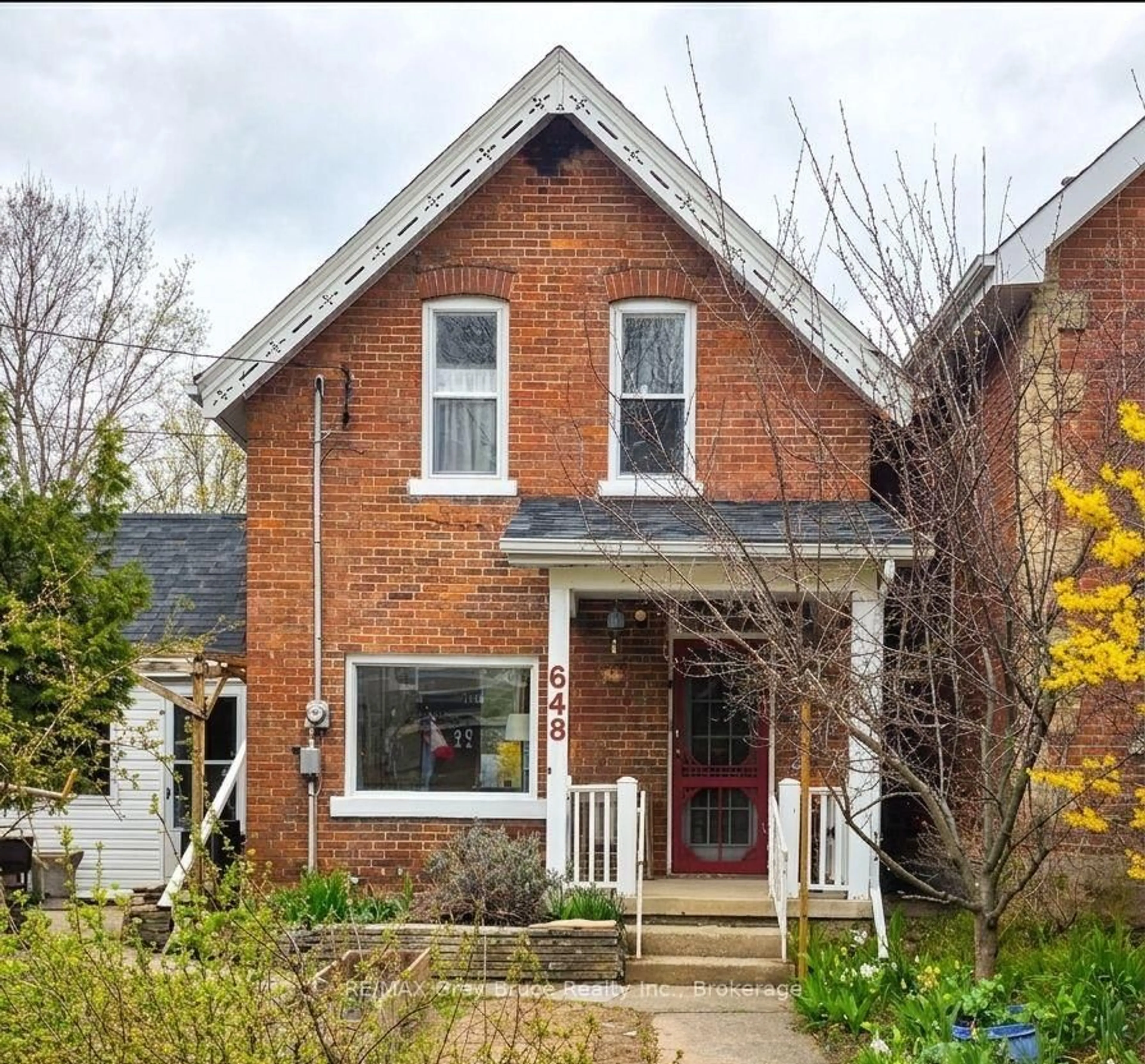 Home with brick exterior material, street for 648 9th St, Owen Sound Ontario N4K 1P7