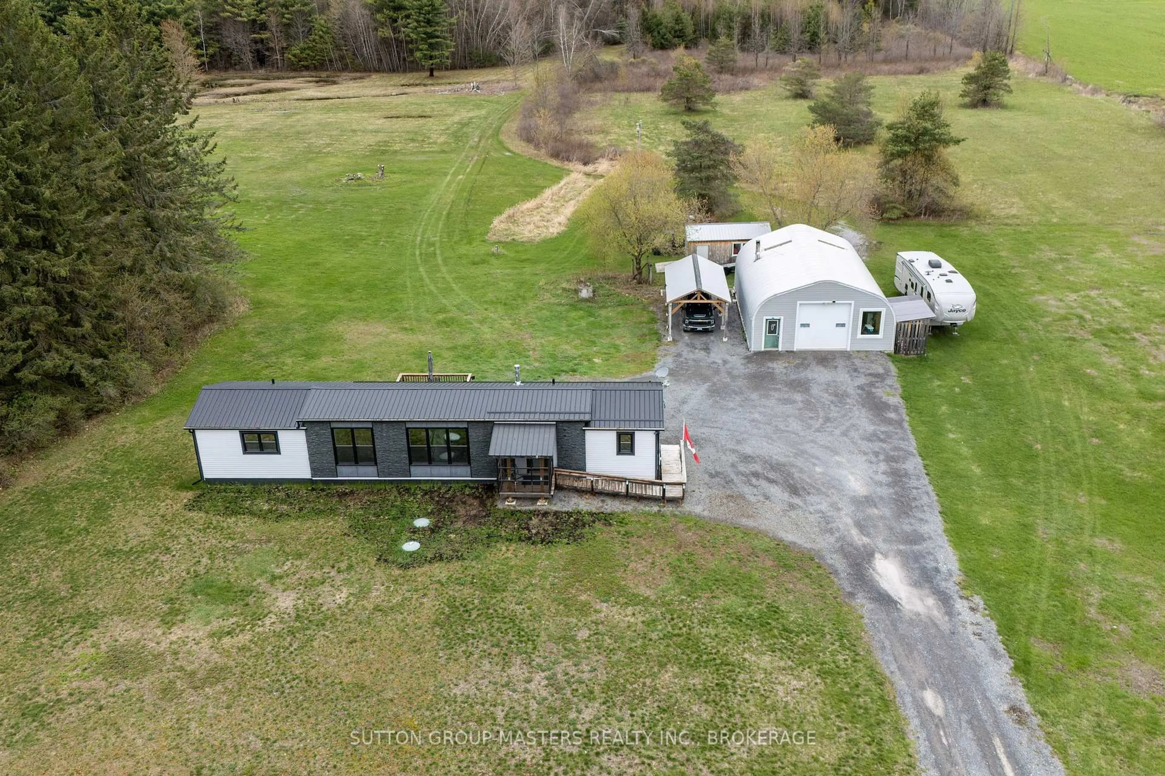 A pic from outside/outdoor area/front of a property/back of a property/a pic from drone, building for 3680 Brewers Mills Rd, Seeley's Bay Ontario K0H 2N0