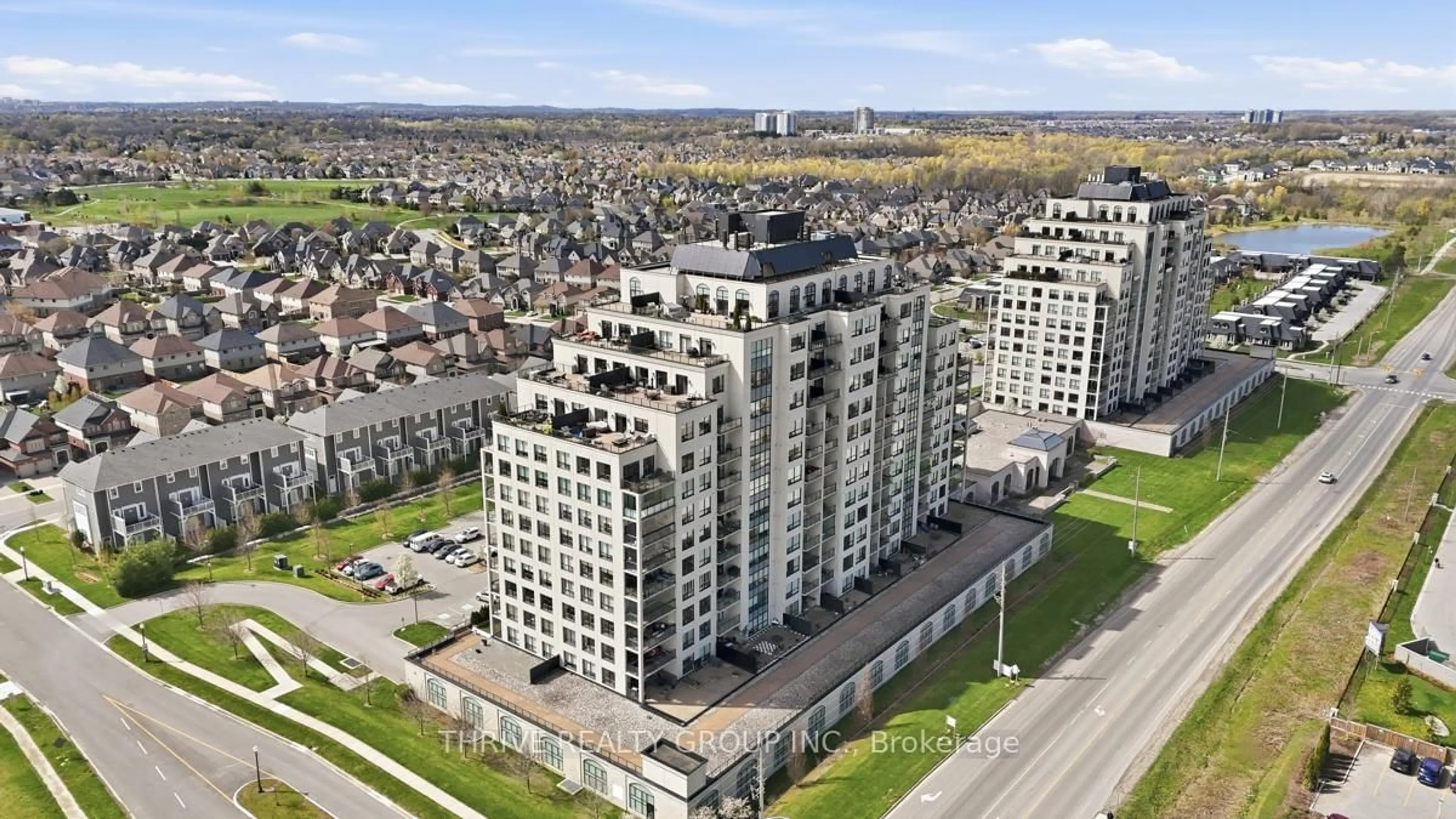A pic from outside/outdoor area/front of a property/back of a property/a pic from drone, city buildings view from balcony for 240 Villagewalk Blvd #404, London North Ontario N6G 0P6