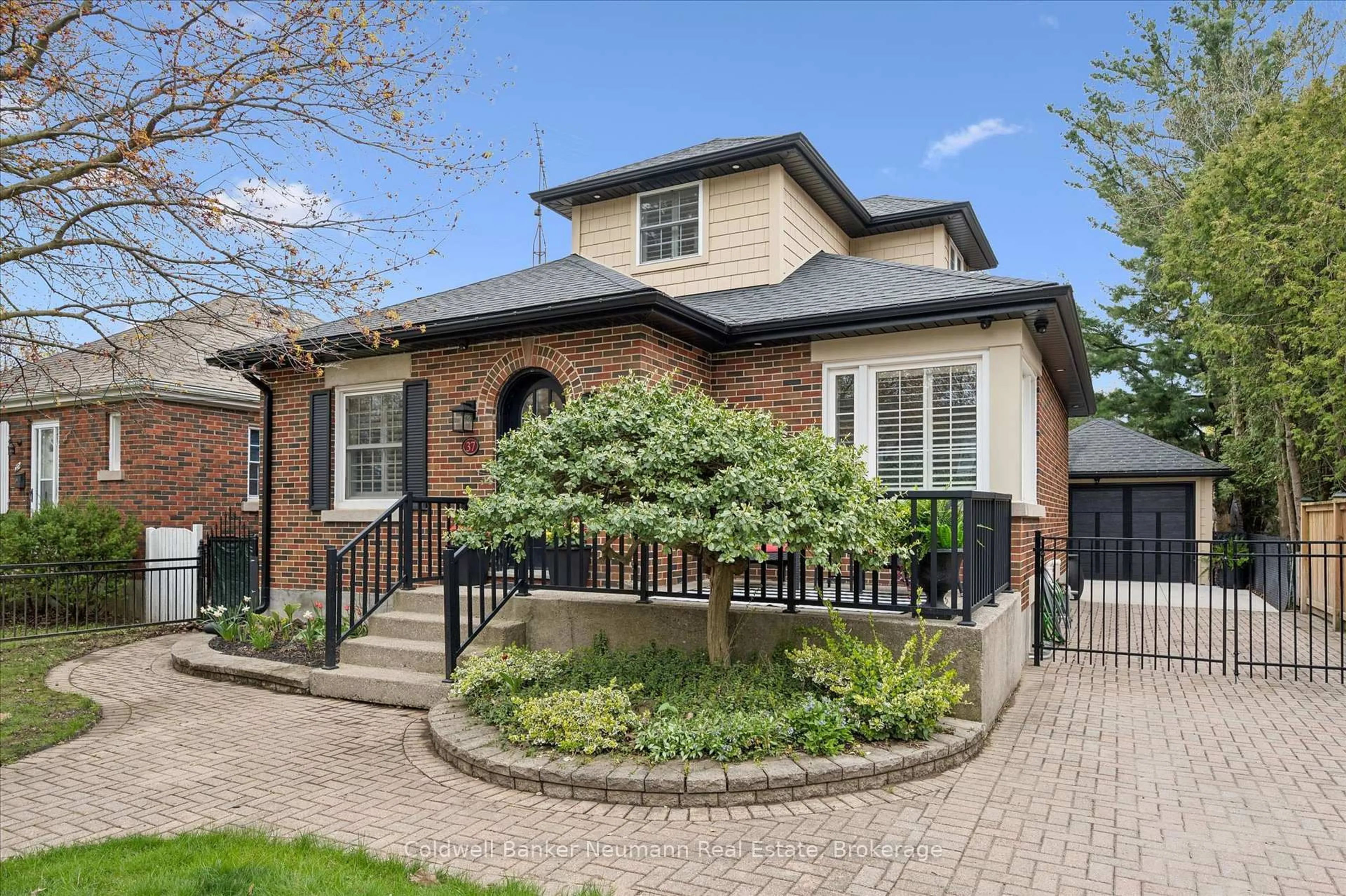 Home with brick exterior material, street for 37 Parkholm Ave, Guelph Ontario N1E 2S4