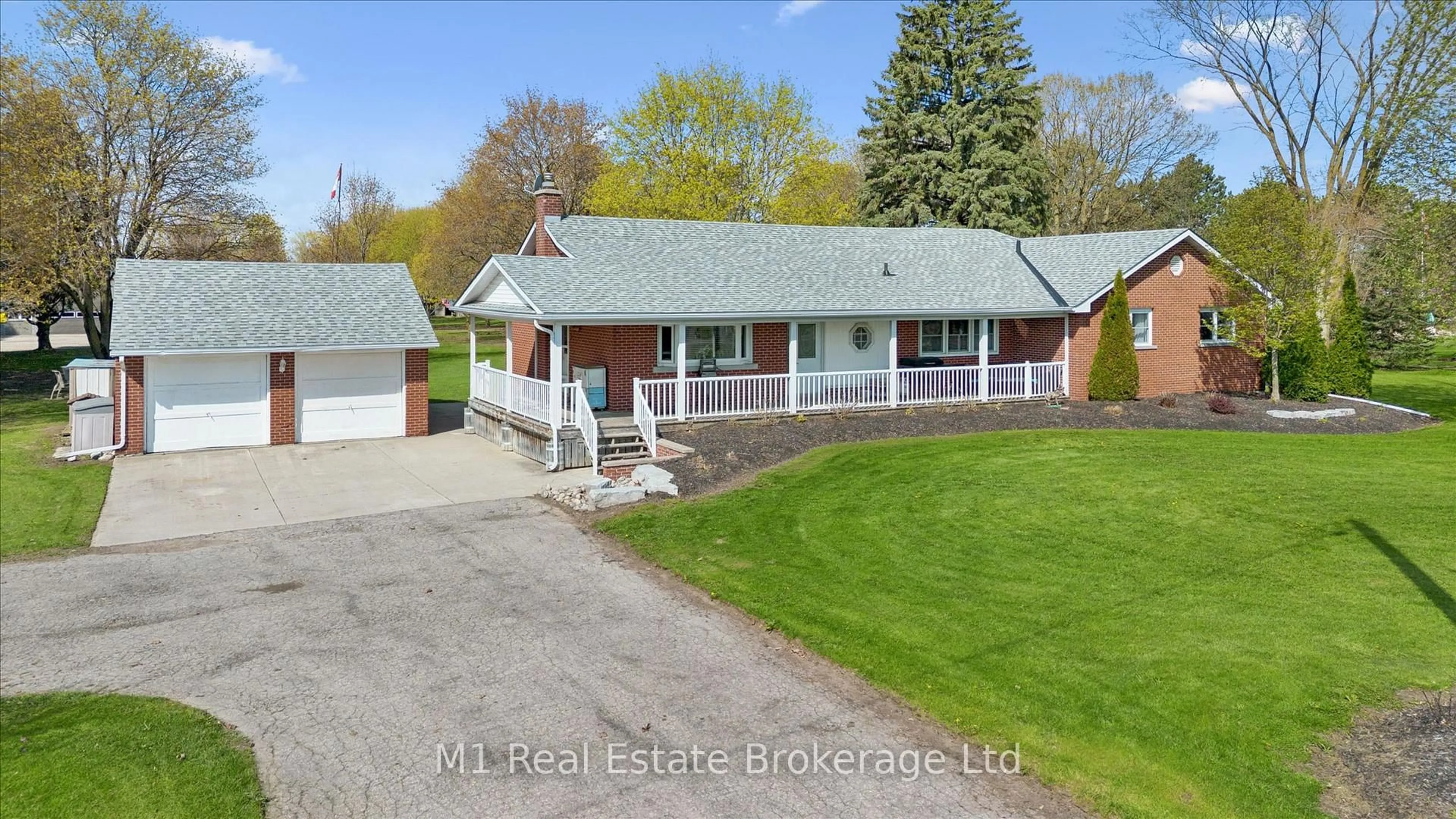 A pic from outside/outdoor area/front of a property/back of a property/a pic from drone, street for 667 Sawmill Rd, Woolwich Ontario N2J 4G8