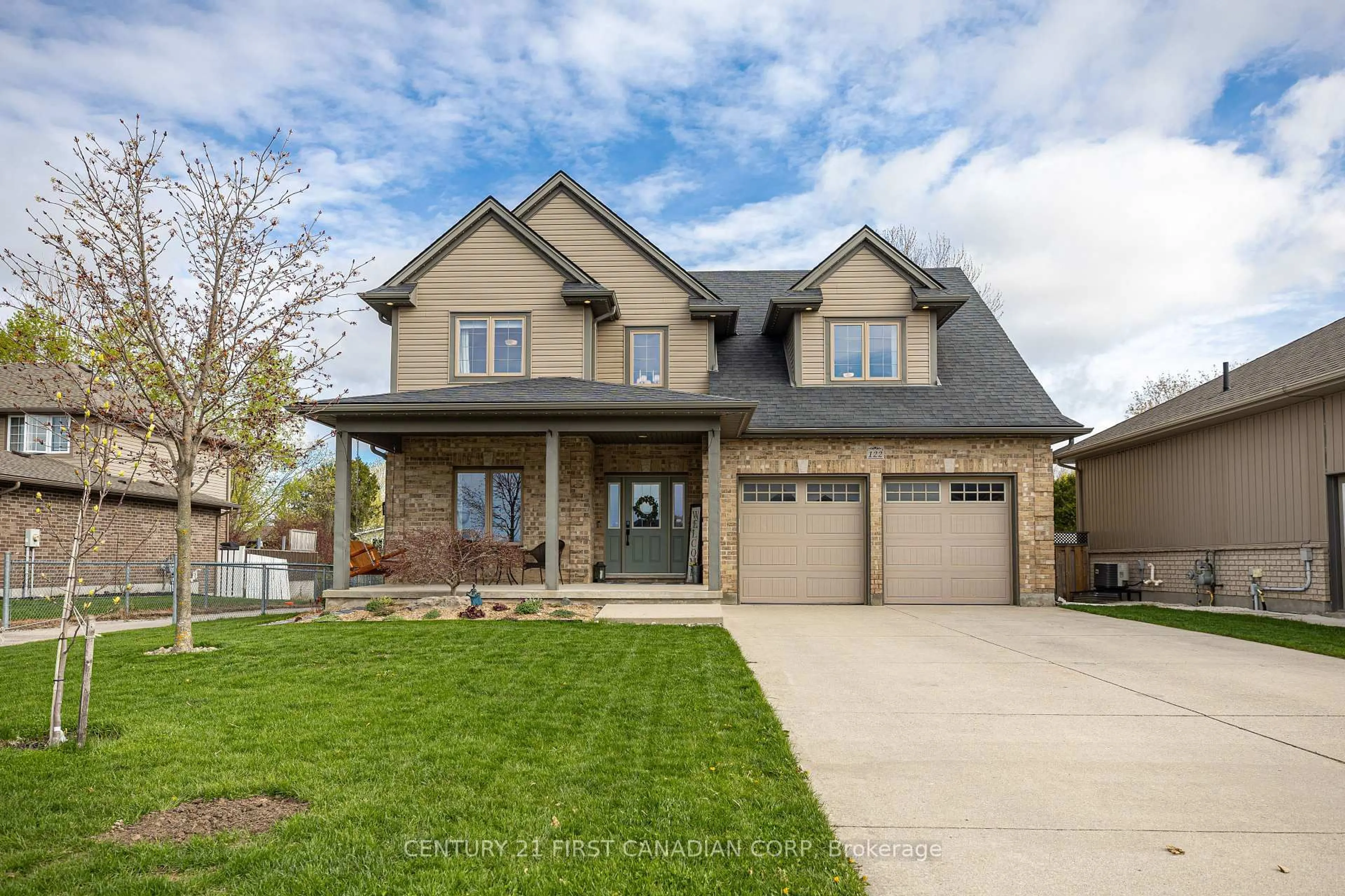 Home with brick exterior material, street for 122 Joseph St, Lucan Biddulph Ontario N0M 2J0