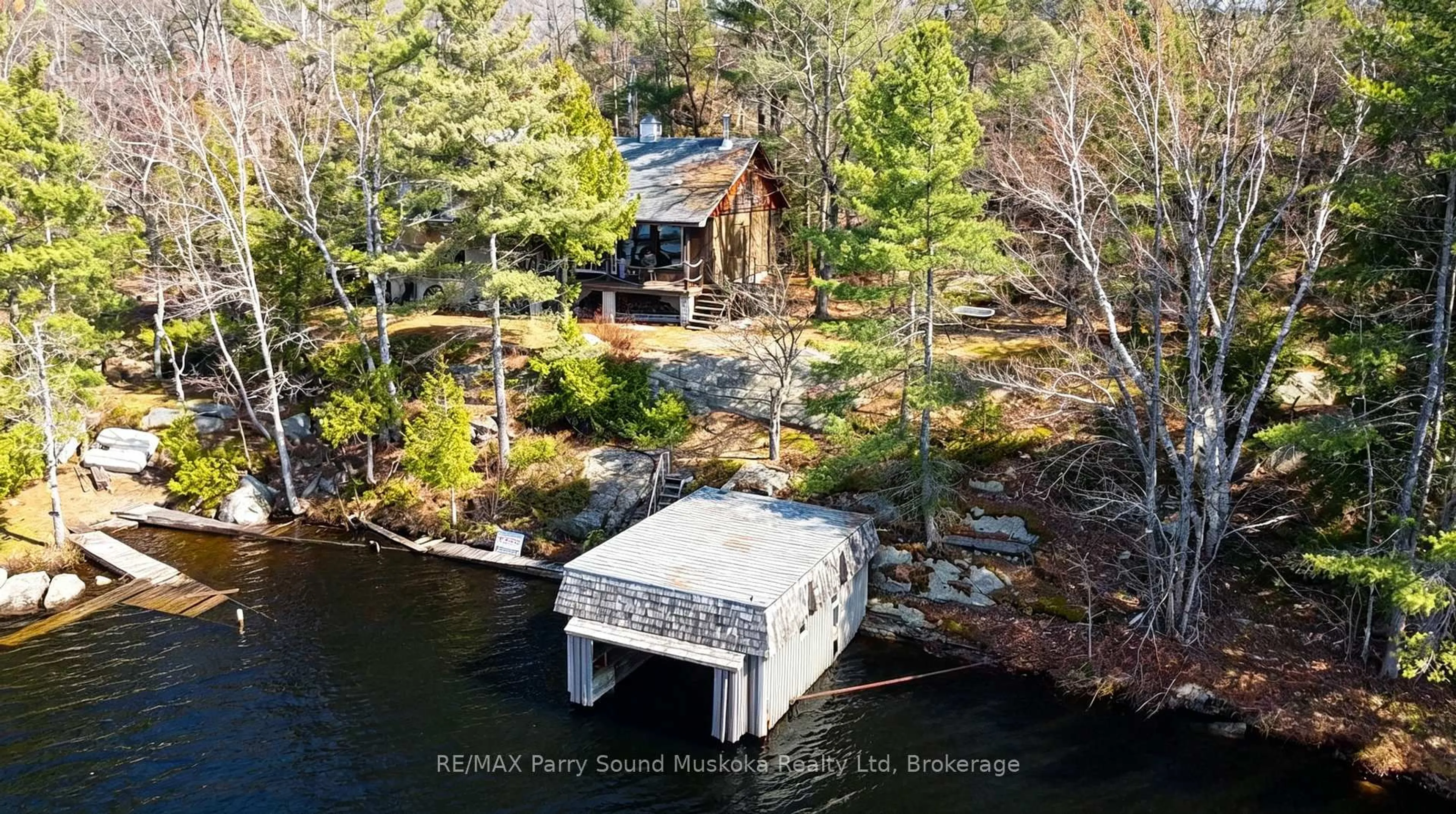 A pic from outside/outdoor area/front of a property/back of a property/a pic from drone, water/lake/river/ocean view for 55 Healey Lake Water, The Archipelago Ontario P2A 0B7