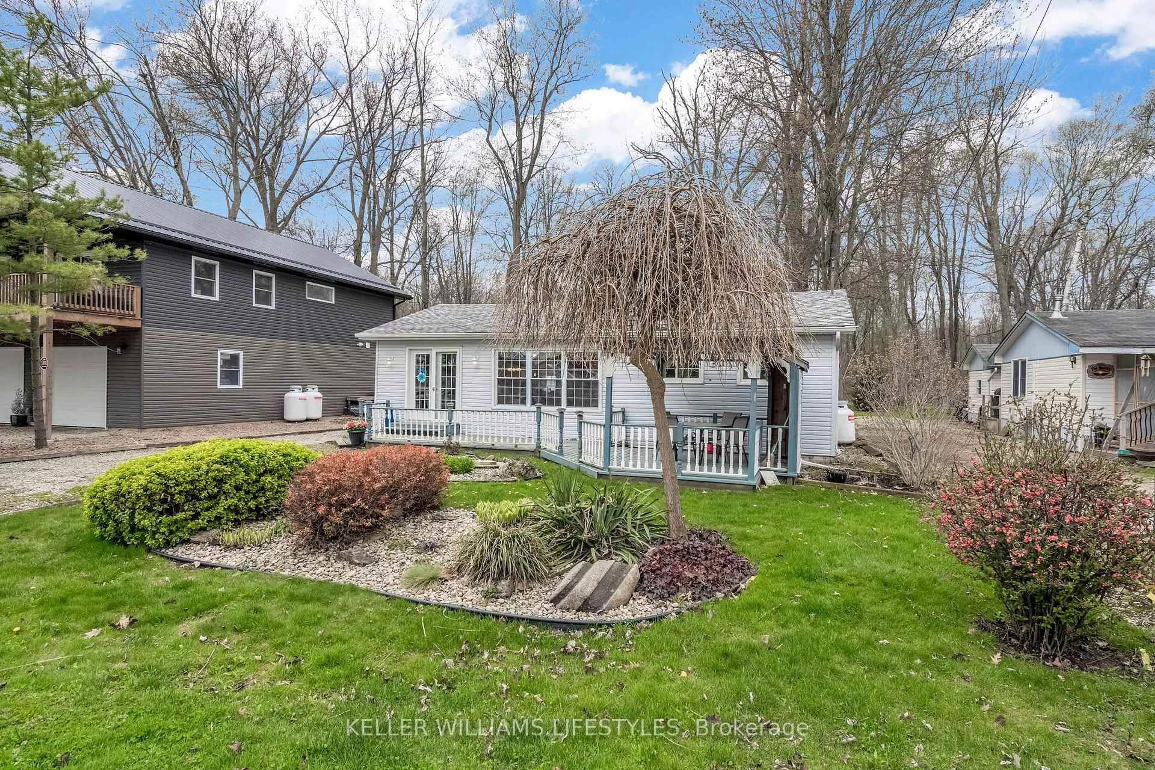 A pic from outside/outdoor area/front of a property/back of a property/a pic from drone, water/lake/river/ocean view for 9900 Lake Rd, Lambton Shores Ontario N0N 1J2