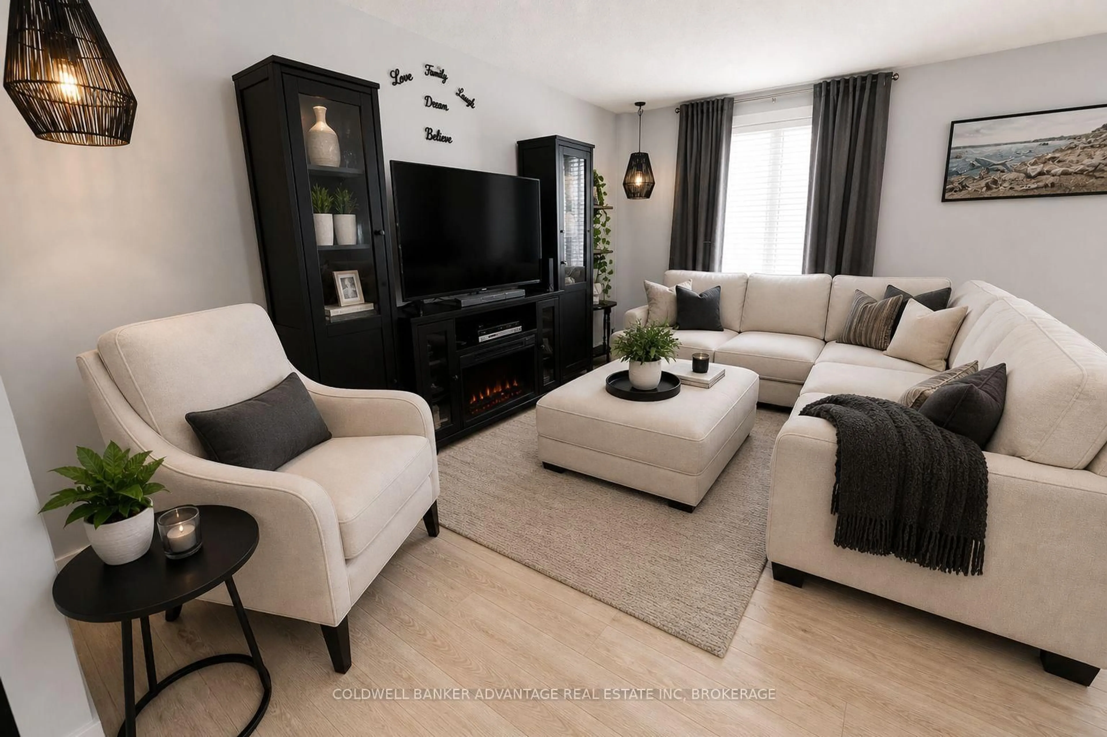 Living room with furniture, wood/laminate floor for 29 Willcher Dr, St. Catharines Ontario L2M 6R2