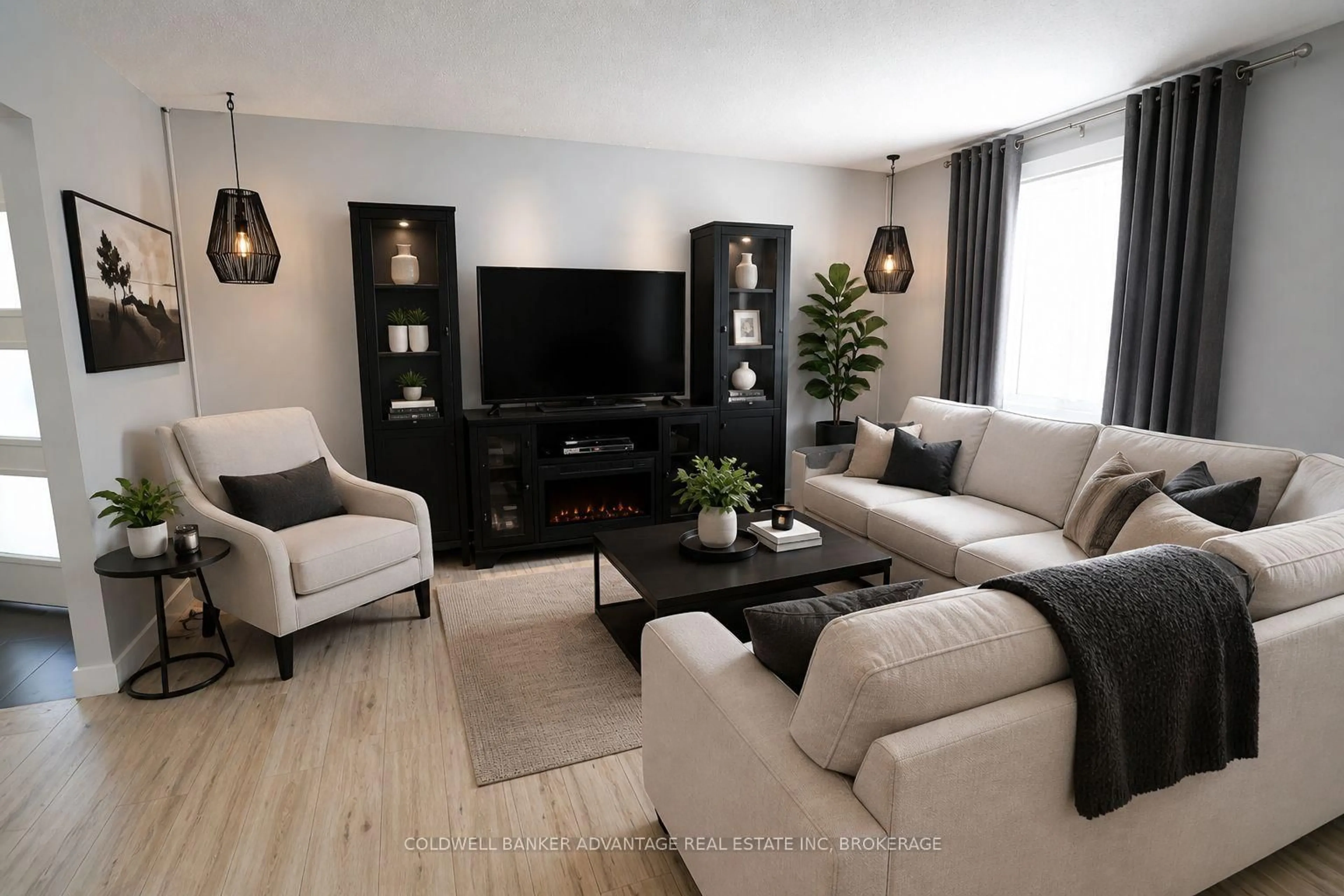 Living room with furniture, wood/laminate floor for 29 Willcher Dr, St. Catharines Ontario L2M 6R2