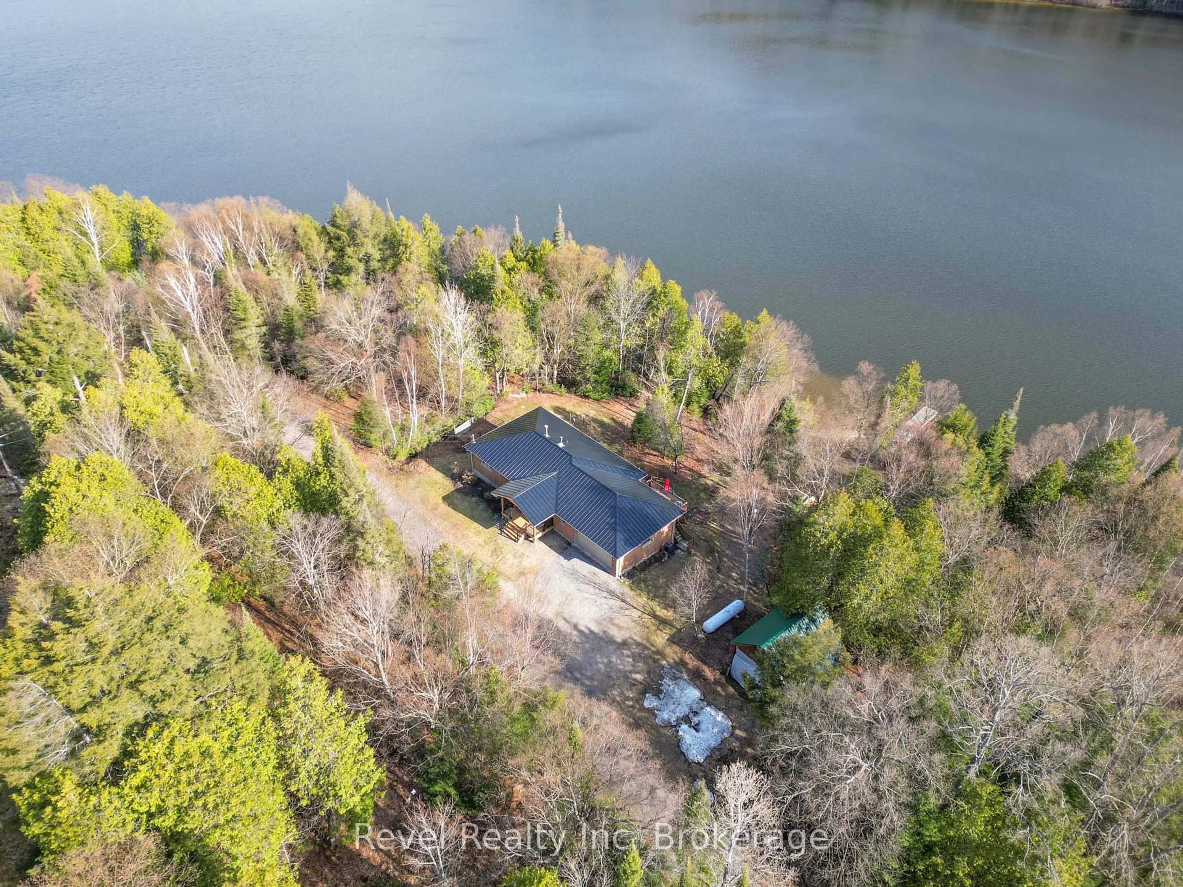 A pic from outside/outdoor area/front of a property/back of a property/a pic from drone, water/lake/river/ocean view for 170K Shorewood Rd, North Bay Ontario P1B 8G4