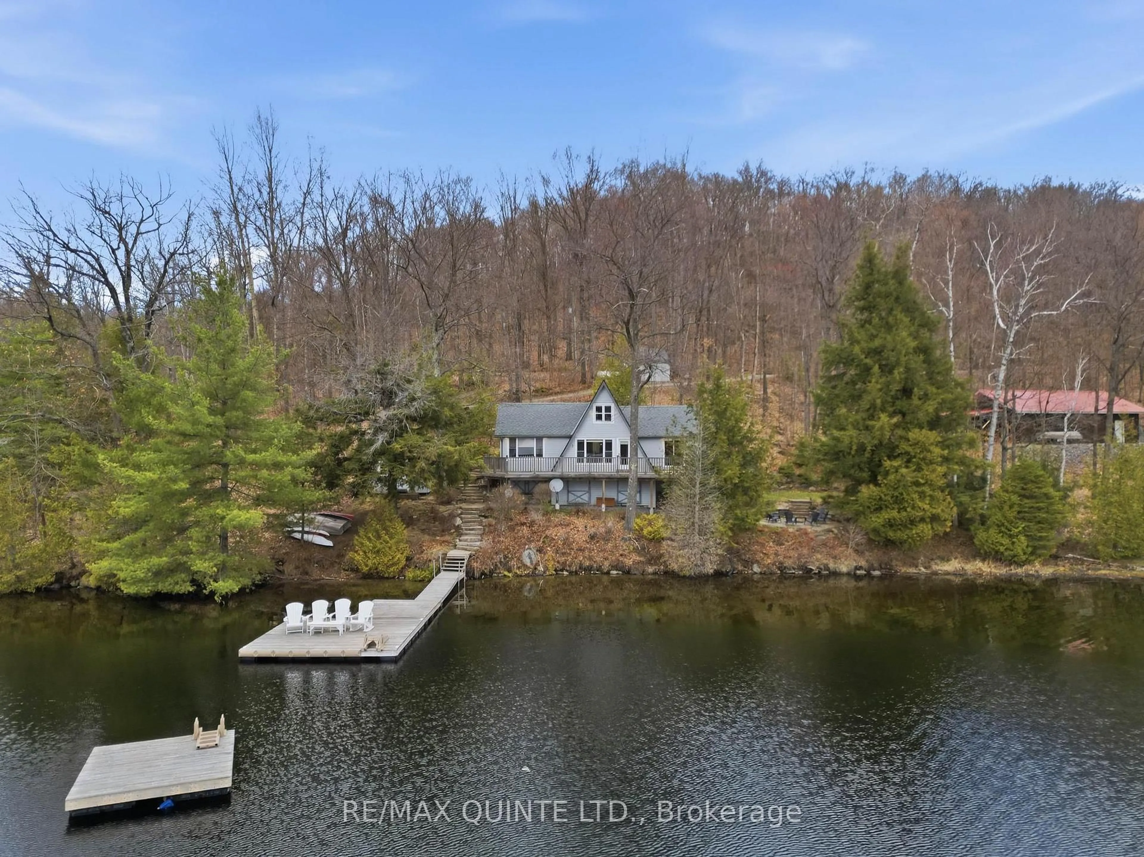 A pic from outside/outdoor area/front of a property/back of a property/a pic from drone, water/lake/river/ocean view for 203 Faradale Dr, Bancroft Ontario K0L 1C0
